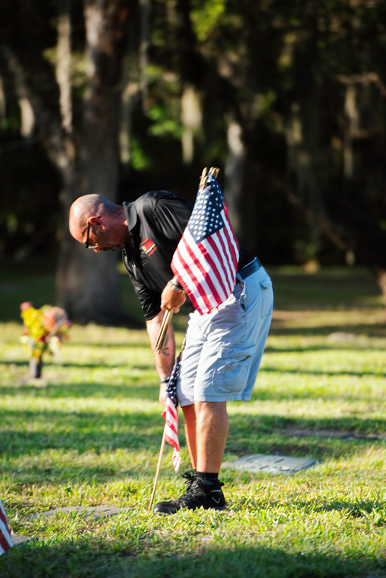 VFW Charlotte Post 5690 places flags on the graves of soldiers who gave their lives while serving the United States Military, at Restlawn Memorial Park, Port Charlotte, Friday May 22, 2020. 