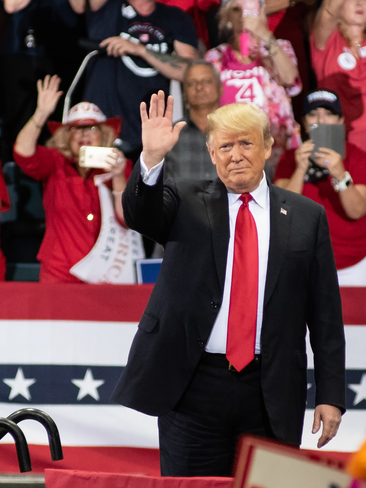 President Donald Trump waves at a rally at Hertz Arena, in Estero Florida, on Wednesday, Oct 31, 2018.