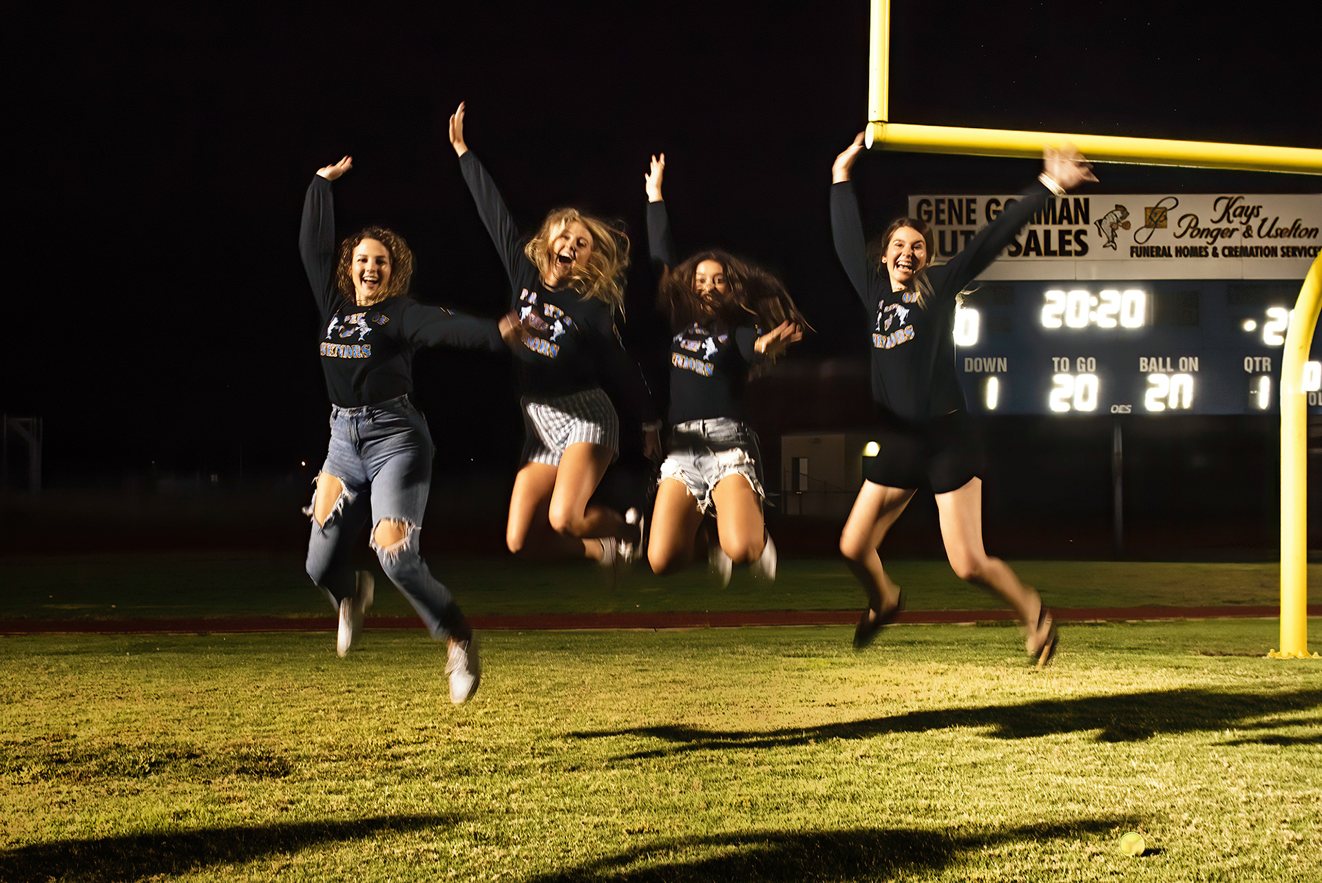 HS Class of 2020 celebrate in an empty stadium