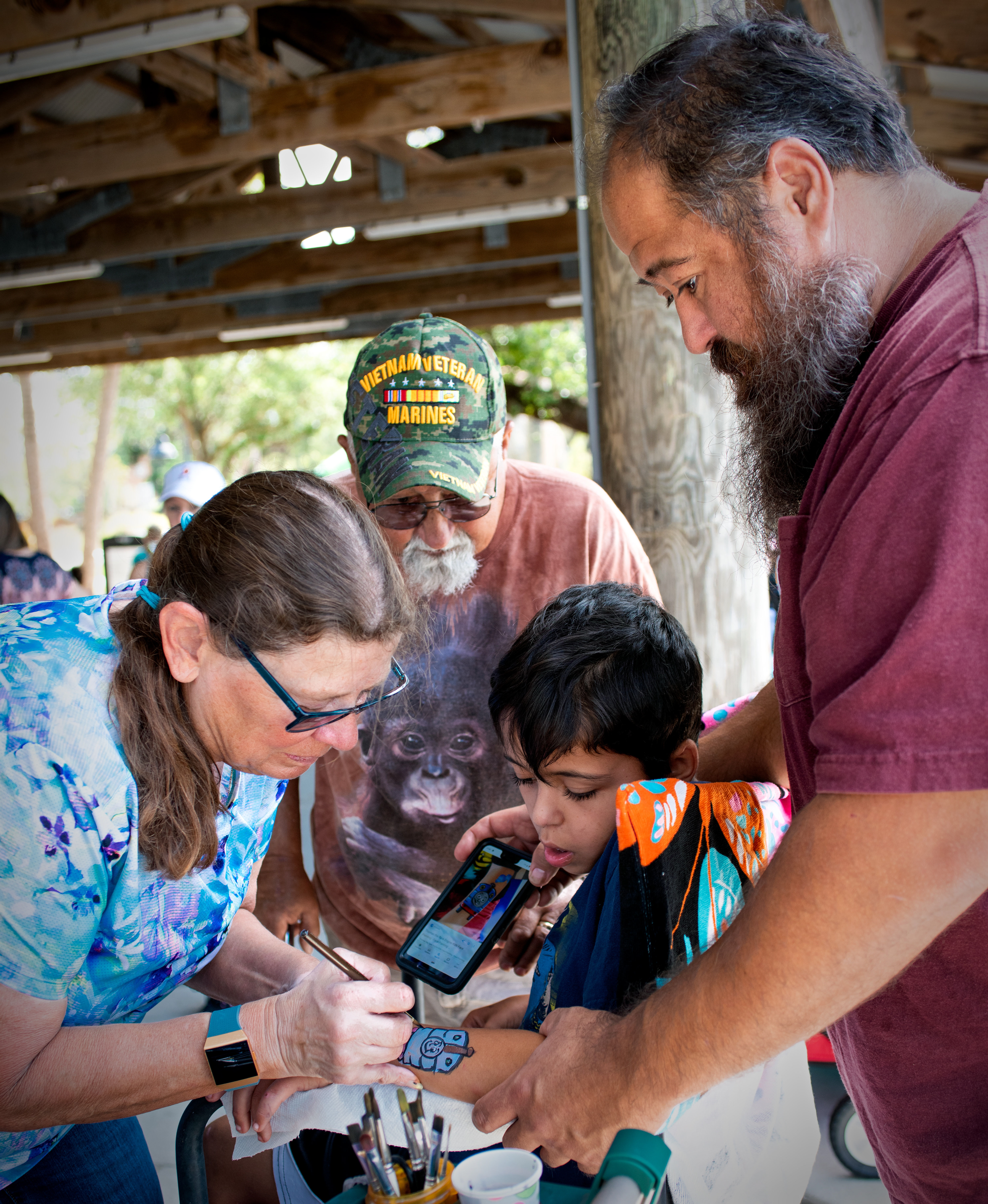 Three generations gather at the Adaptive Easter Egg Hunt, for children with special needs.