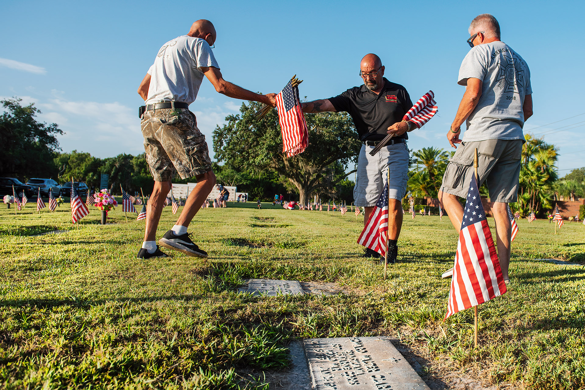 VFW Charlotte Post 5690 places flags on the graves of soldiers who gave their lives while serving the United States Military, at Restlawn Memorial Park, Port Charlotte, Friday May 22, 2020. 