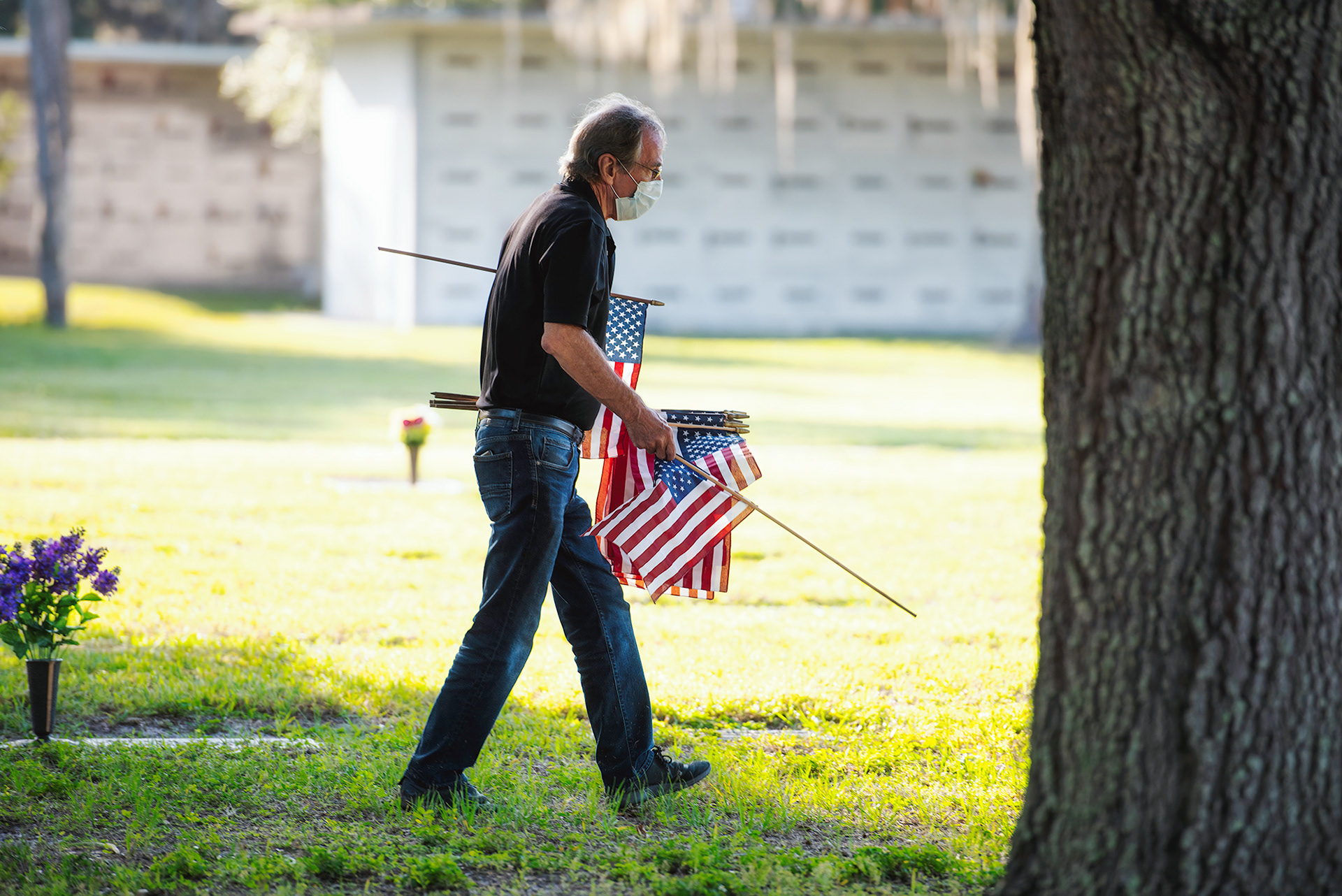 VFW Charlotte Post 5690 places flags on the graves of soldiers who gave their lives while serving the United States Military, at Restlawn Memorial Park, Port Charlotte, Friday May 22, 2020. 