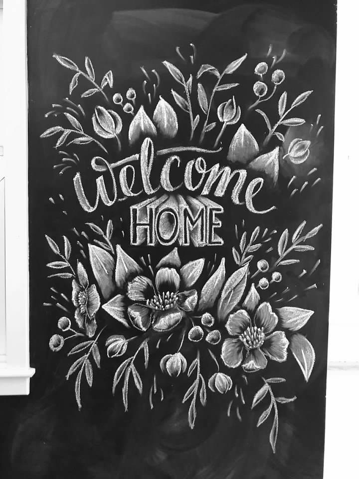 We had a blackboard wall in our last house, and I had a lot of fun sketching messages for everyone. This one was for a child who came home after an extended absence.