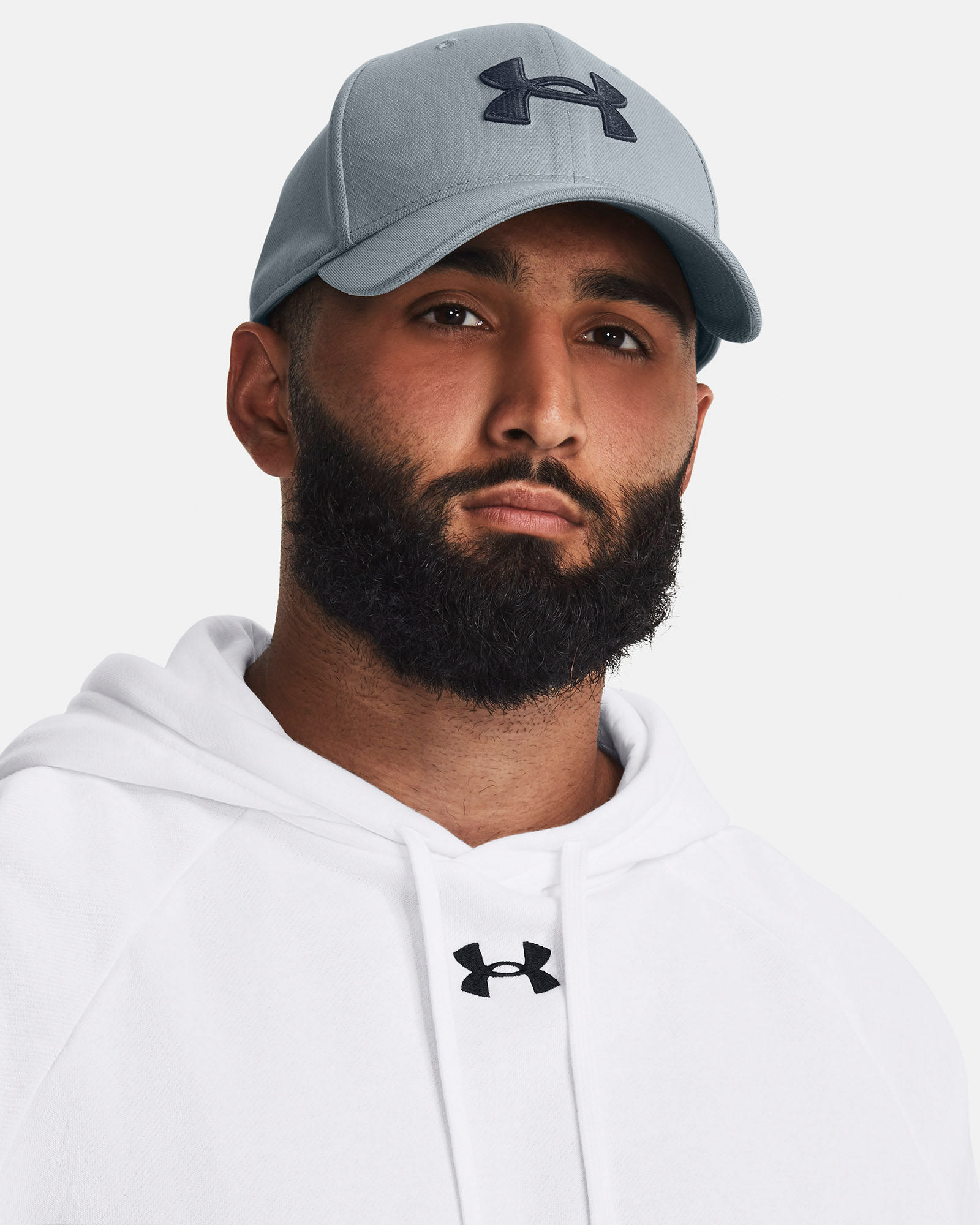 Muhammad Abbasi | Under Armour | Hats & Accessories | Light grey hat, white hoodie