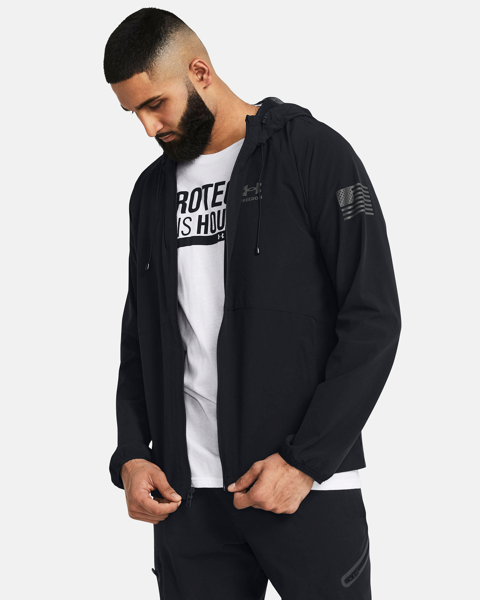 Muhammad Abbasi | Under Armour | Ecom Shoot | Black jacket with “Protect This House” tee