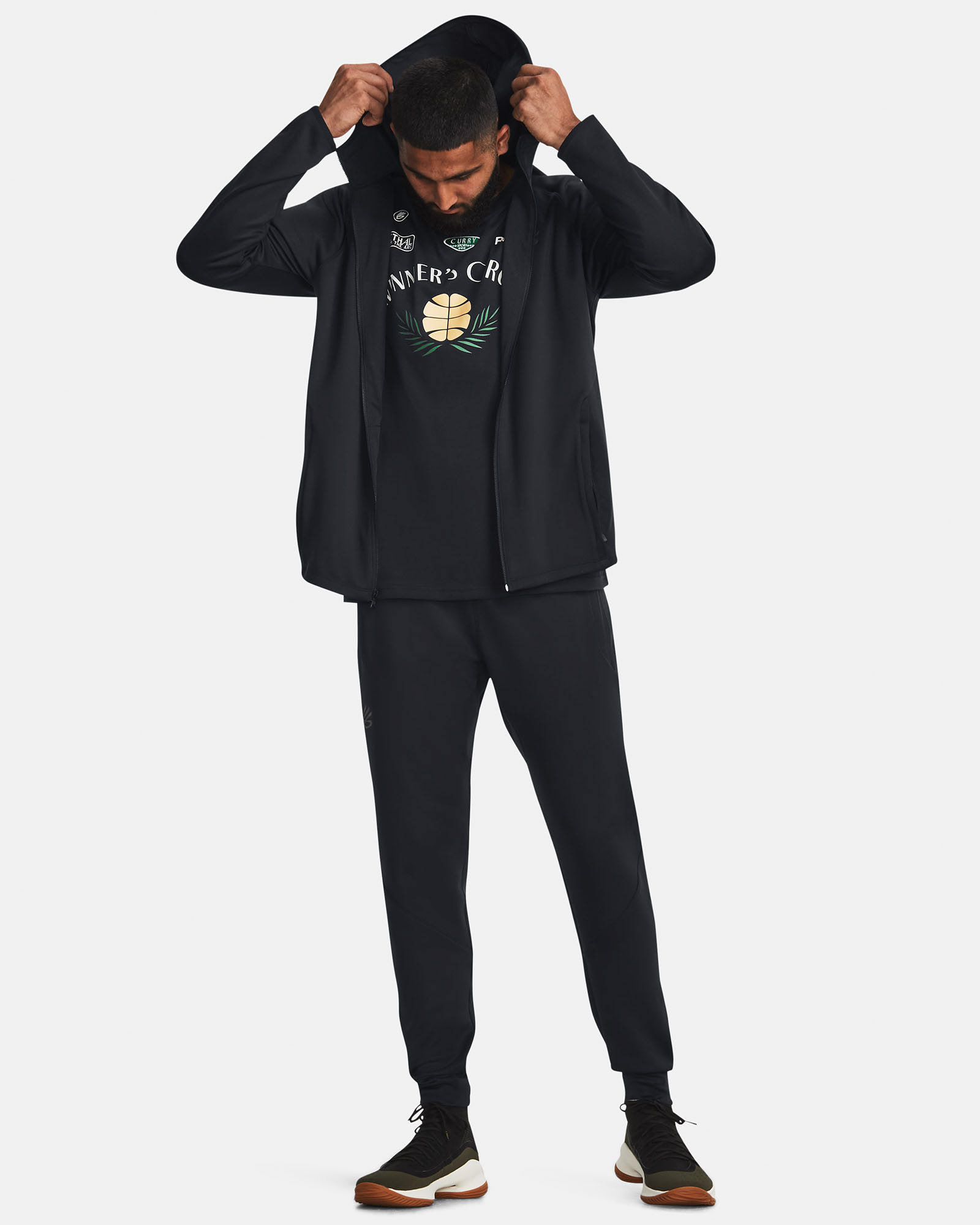 Muhammad Abbasi | Under Armour | Ecom Shoot | Black full-zip hoodie with basketball graphic tee