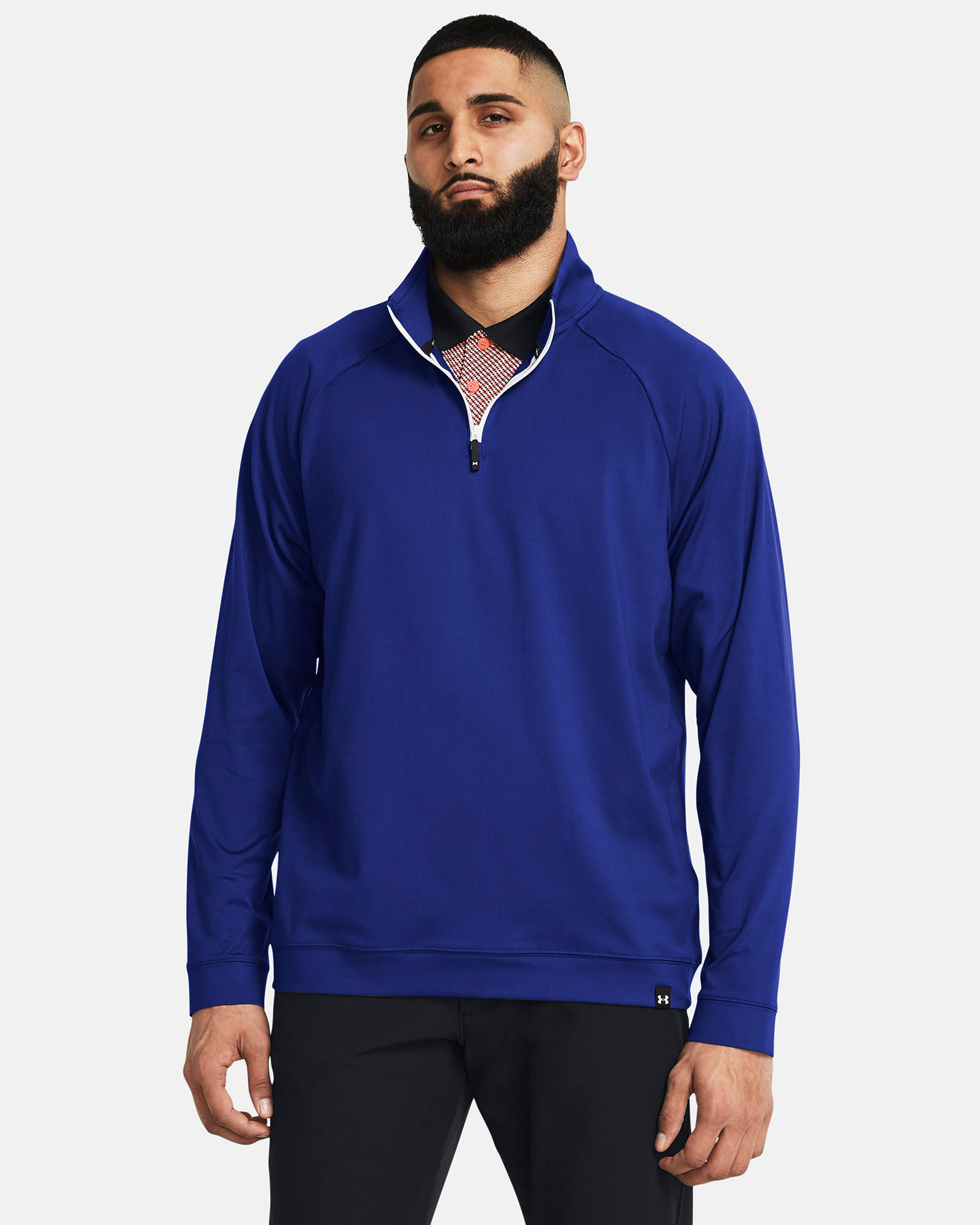 Muhammad Abbasi | Under Armour | Ecom Shoot | Royal blue quarter-zip pullover with black pants
