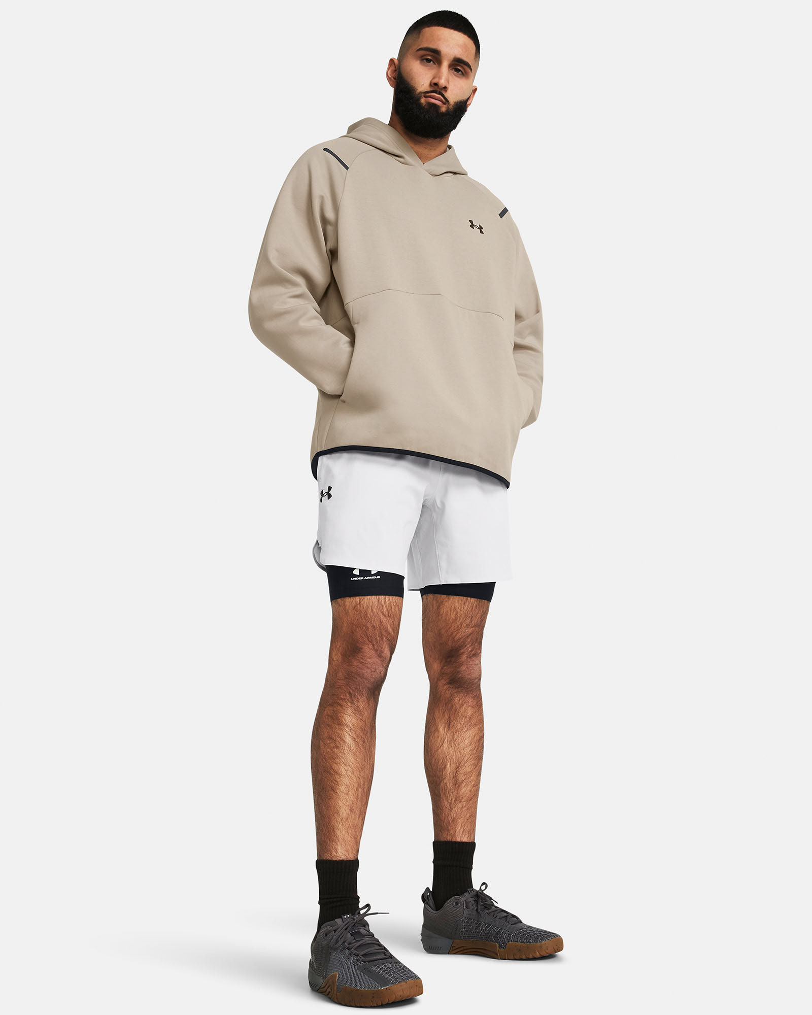 Muhammad Abbasi | Under Armour | Ecom Shoot | Beige hoodie with white athletic shorts