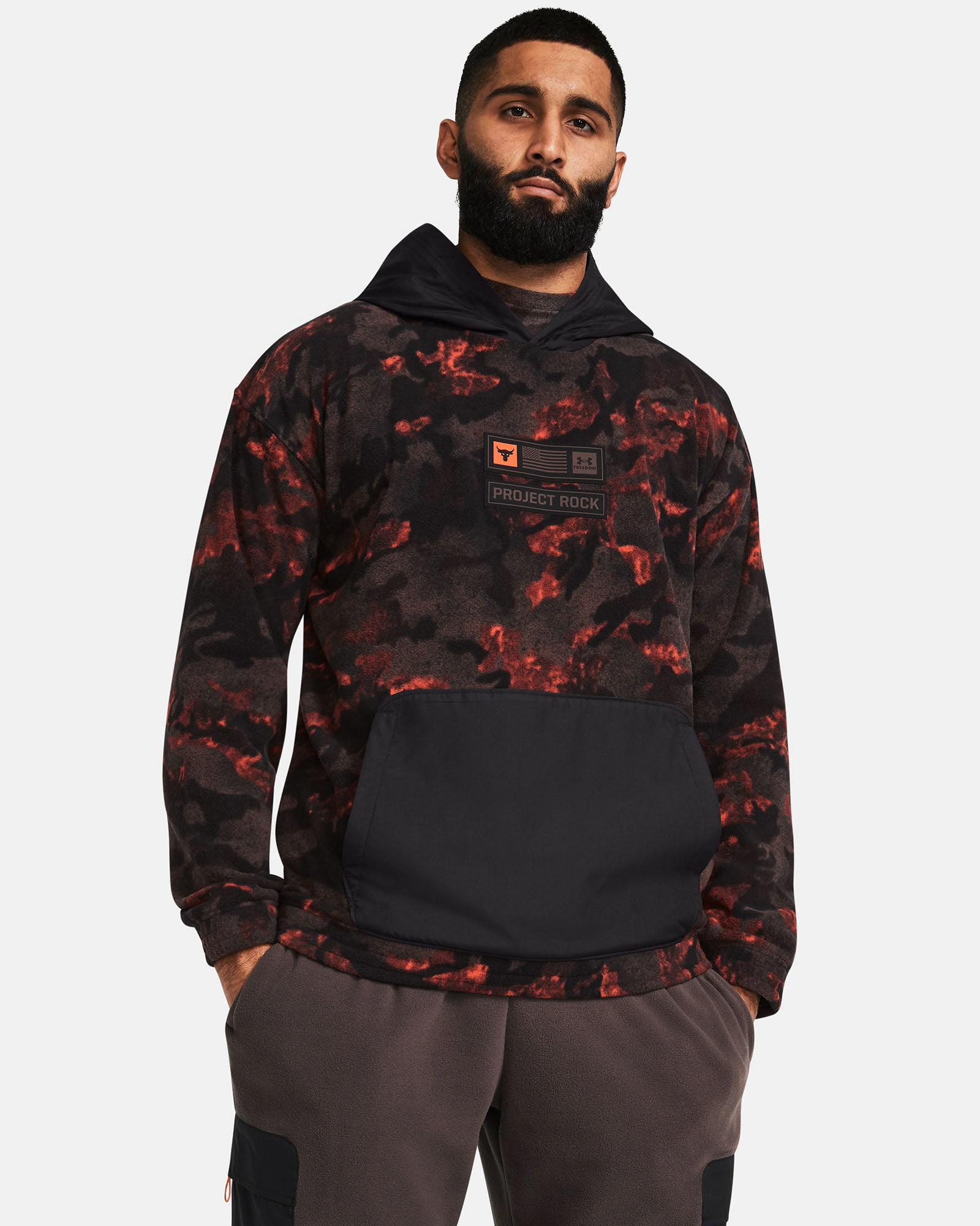 Muhammad Abbasi | Under Armour | Ecom Shoot | Red and black camo Project Rock hoodie with black pocket