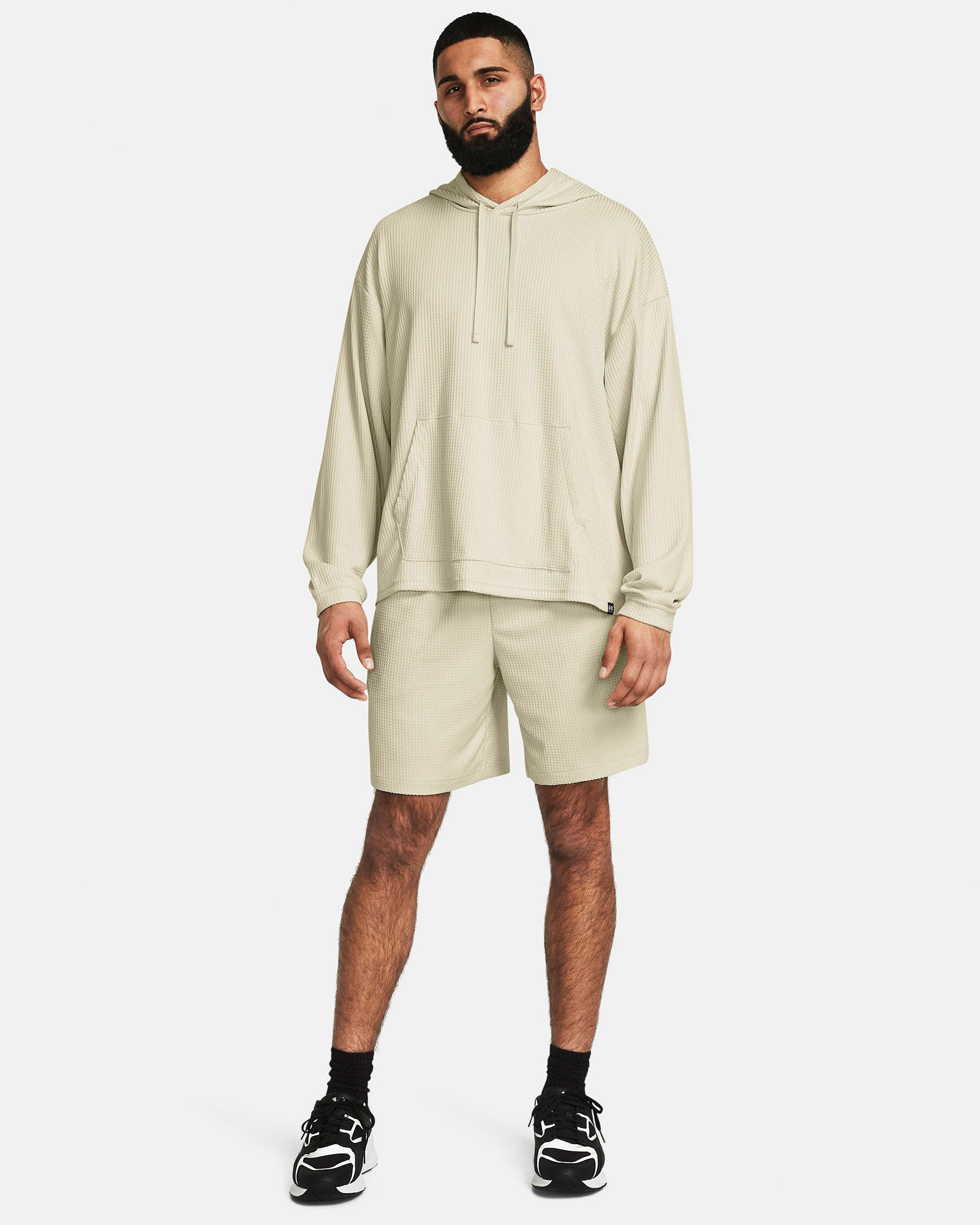 Muhammad Abbasi | Under Armour | Ecom Shoot | Beige oversized hoodie with matching shorts