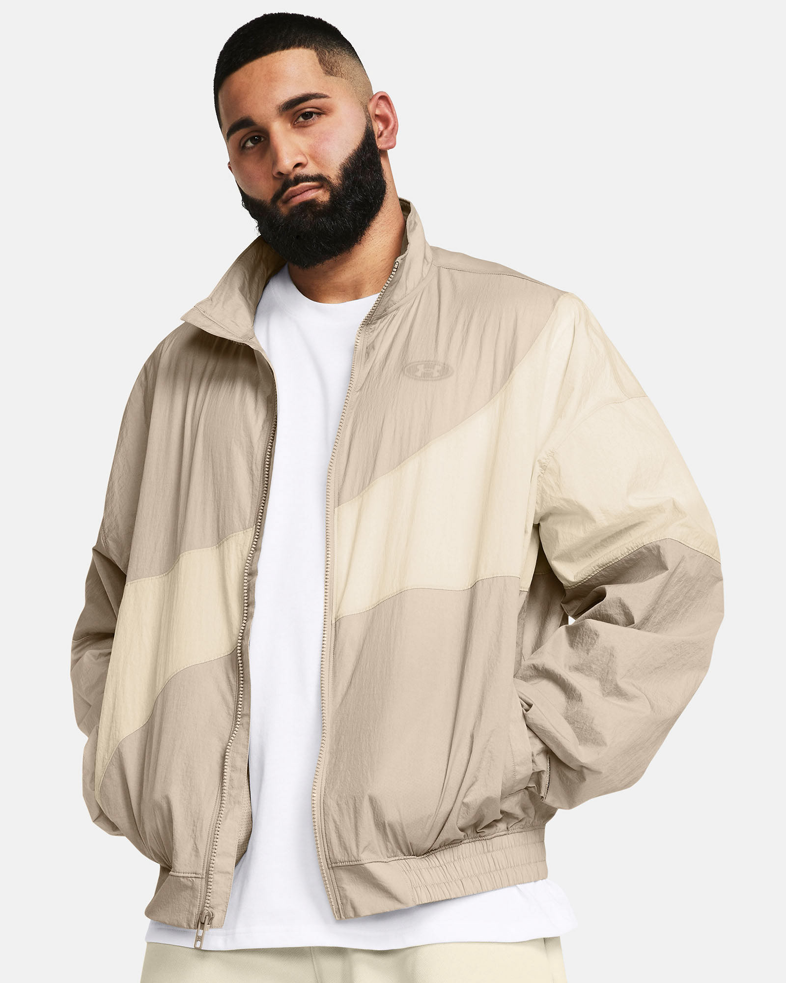 Muhammad Abbasi | Under Armour | Ecom Shoot | Beige windbreaker jacket