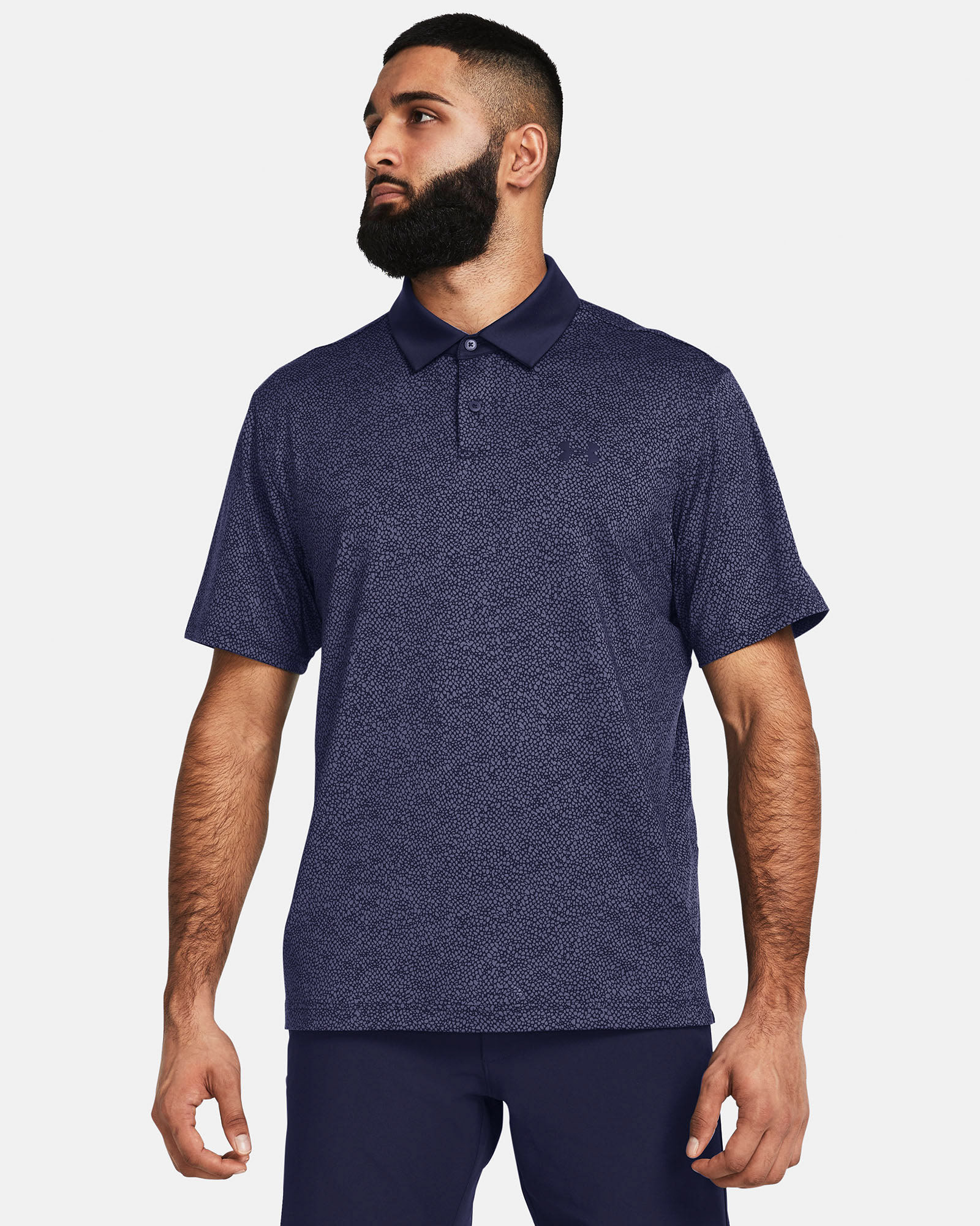 Muhammad Abbasi | Under Armour | Ecom Shoot | Navy patterned polo shirt with navy pants