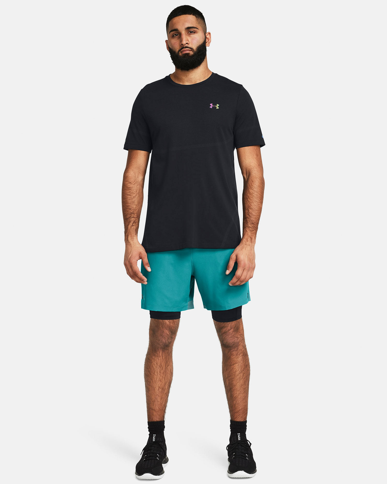 Muhammad Abbasi | Under Armour | Ecom Shoot | Black short-sleeve tee with teal shorts