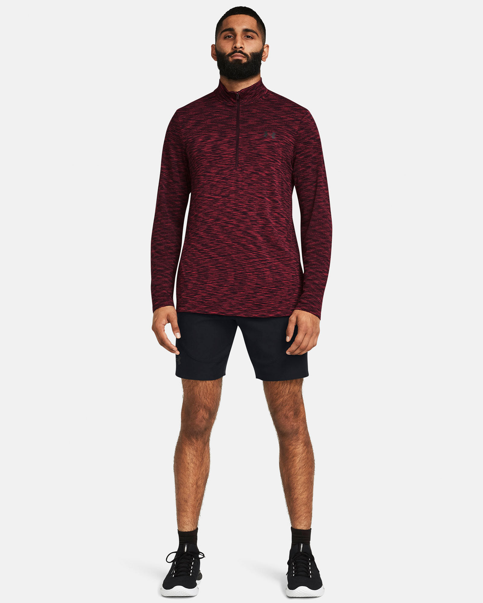 Muhammad Abbasi | Under Armour | Ecom Shoot | Red quarter-zip pullover with black shorts