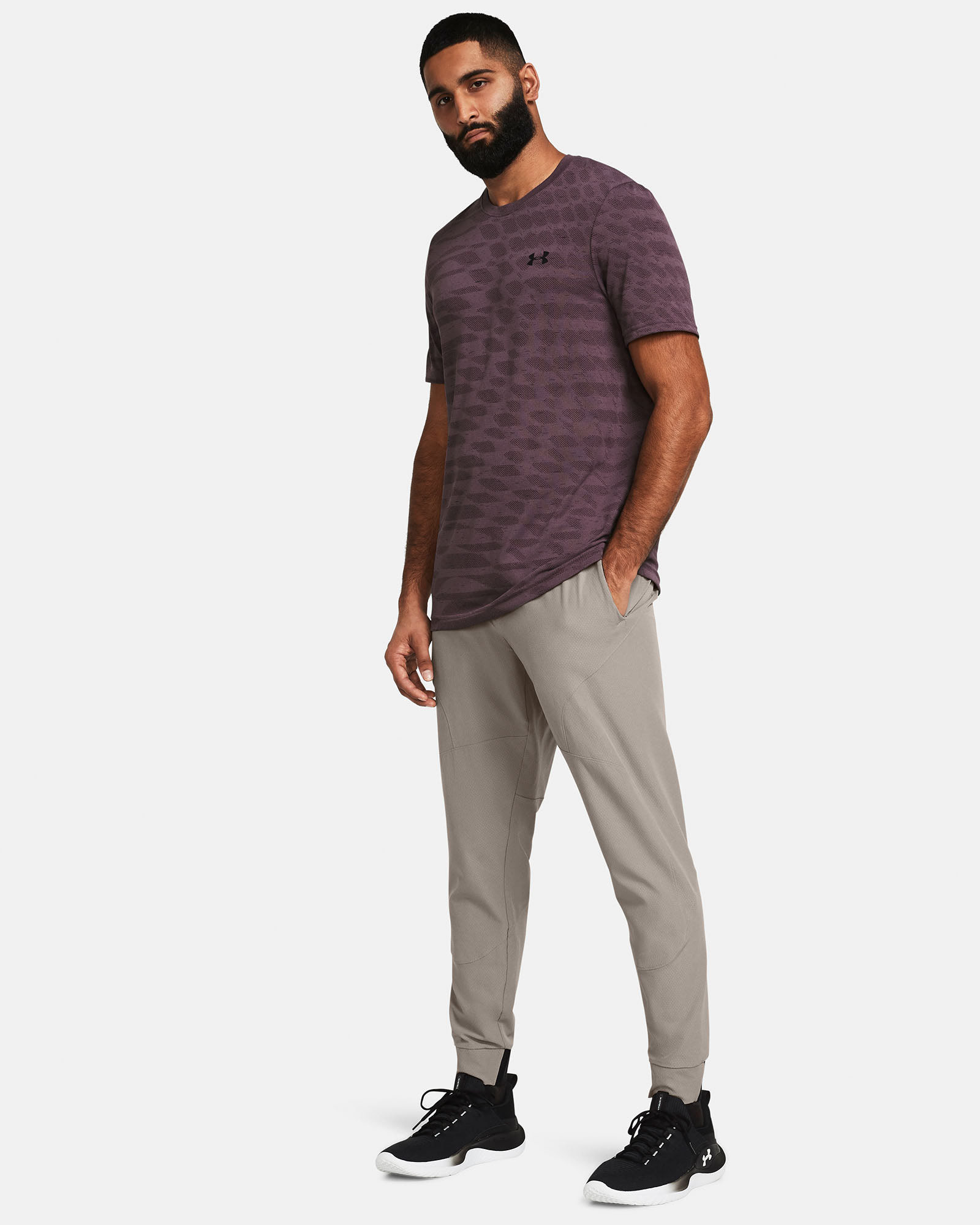 Muhammad Abbasi | Under Armour | Ecom Shoot | Maroon patterned tee with grey pants