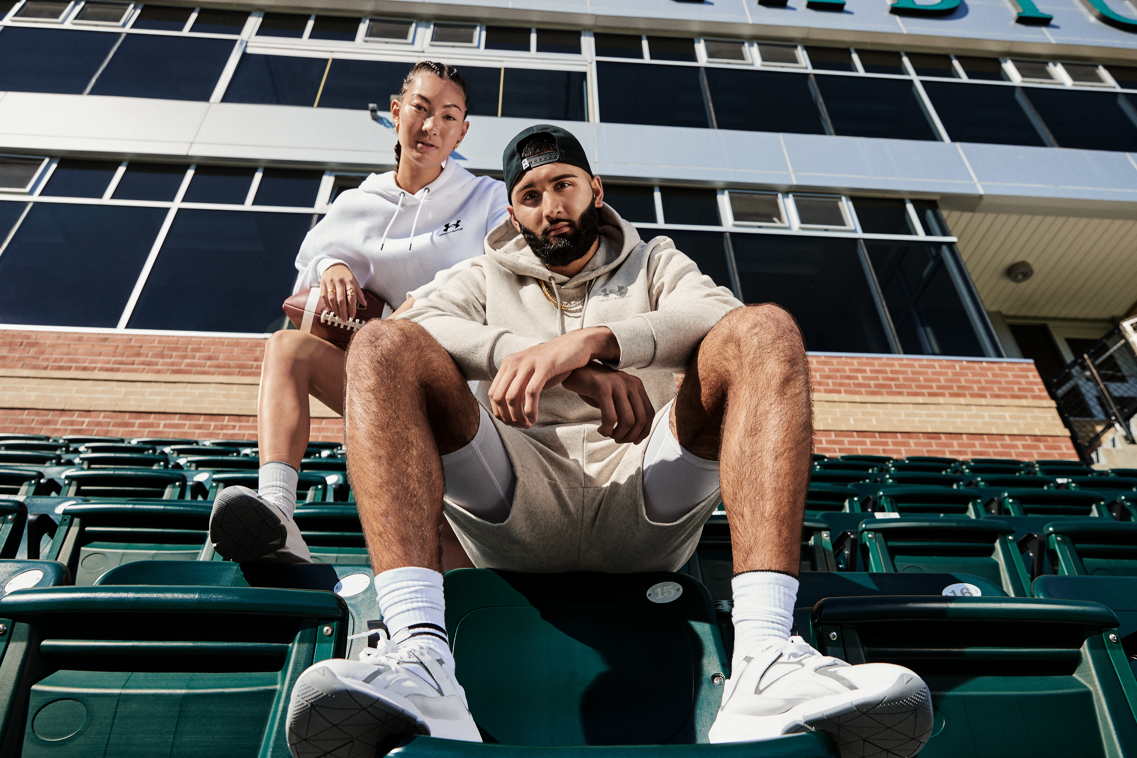 Muhammad Abbasi | Under Armour | ICON Fleece Hoodie | With Model Wearing White Hoodie in Stadium