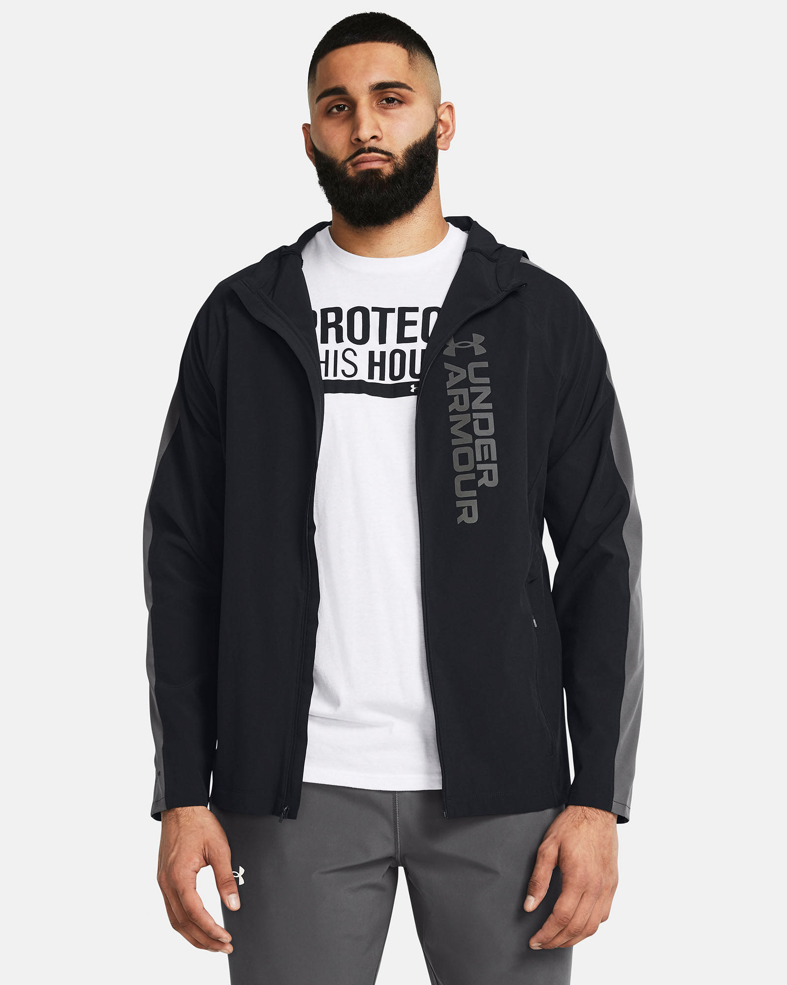 Muhammad Abbasi | Under Armour | Ecom Shoot | Black and white jacket with “Protect This House” tee