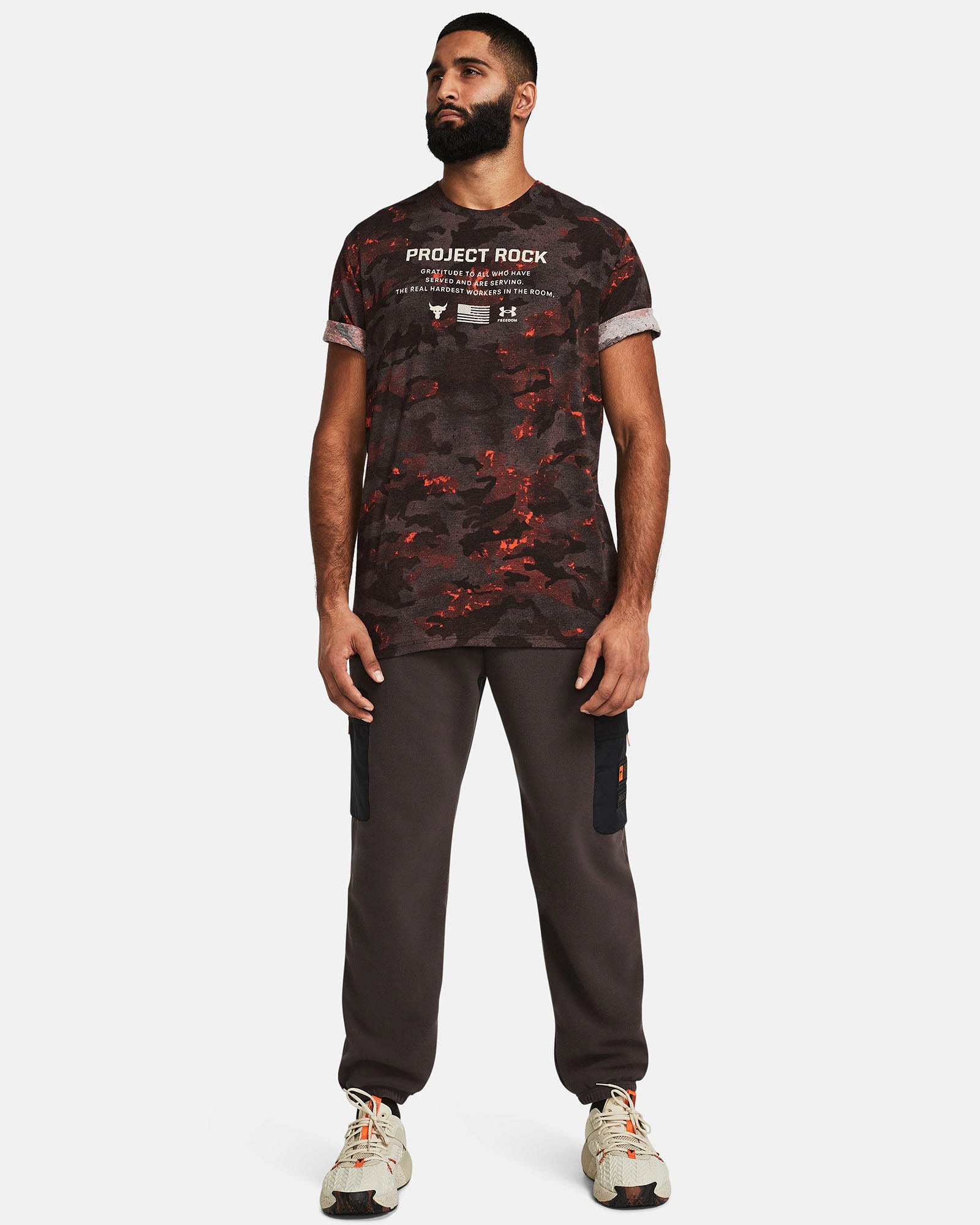 Muhammad Abbasi | Under Armour | Ecom Shoot | Red and black camo Project Rock tee with brown joggers