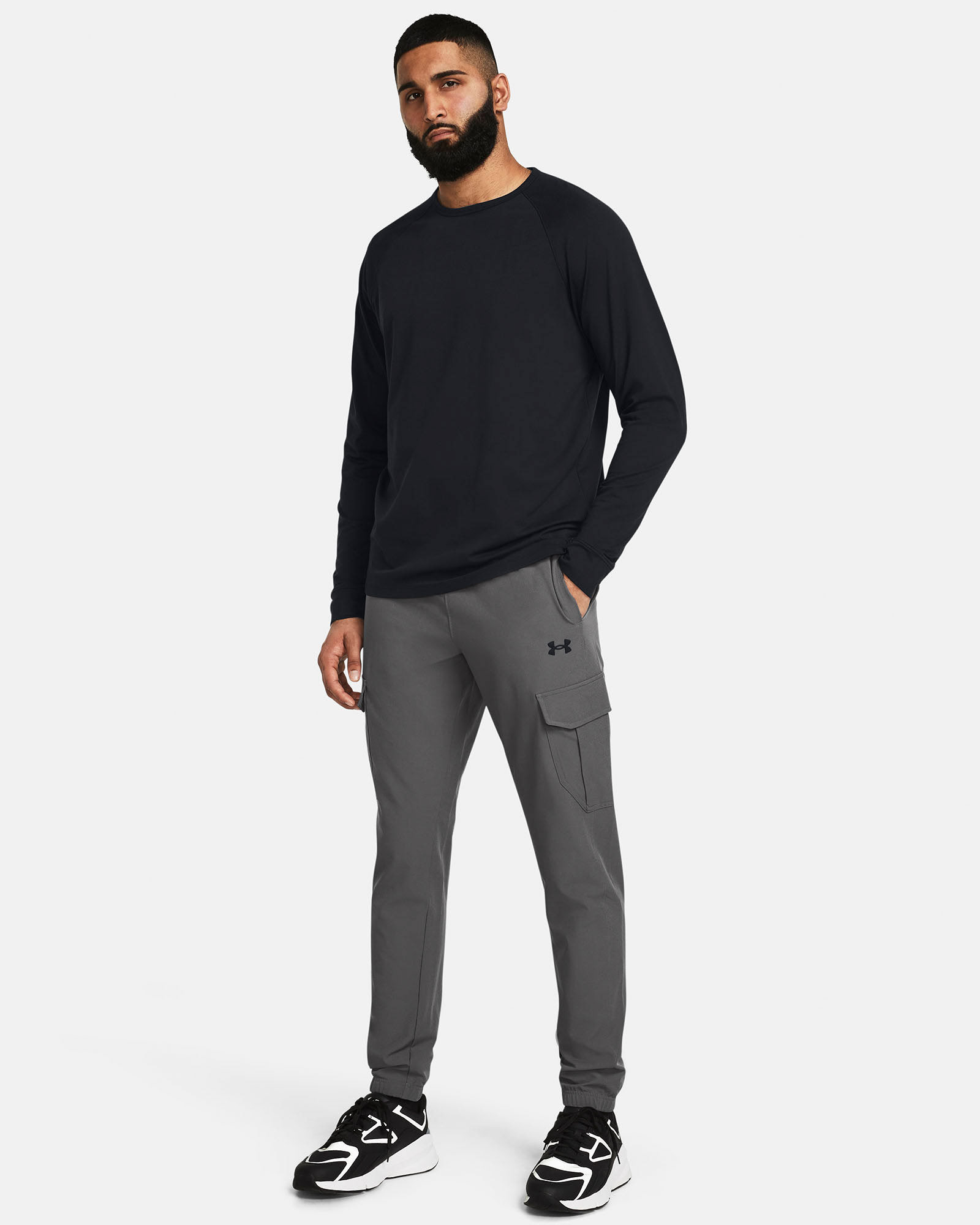 Muhammad Abbasi | Under Armour | Ecom Shoot | Black long-sleeve top with grey pants