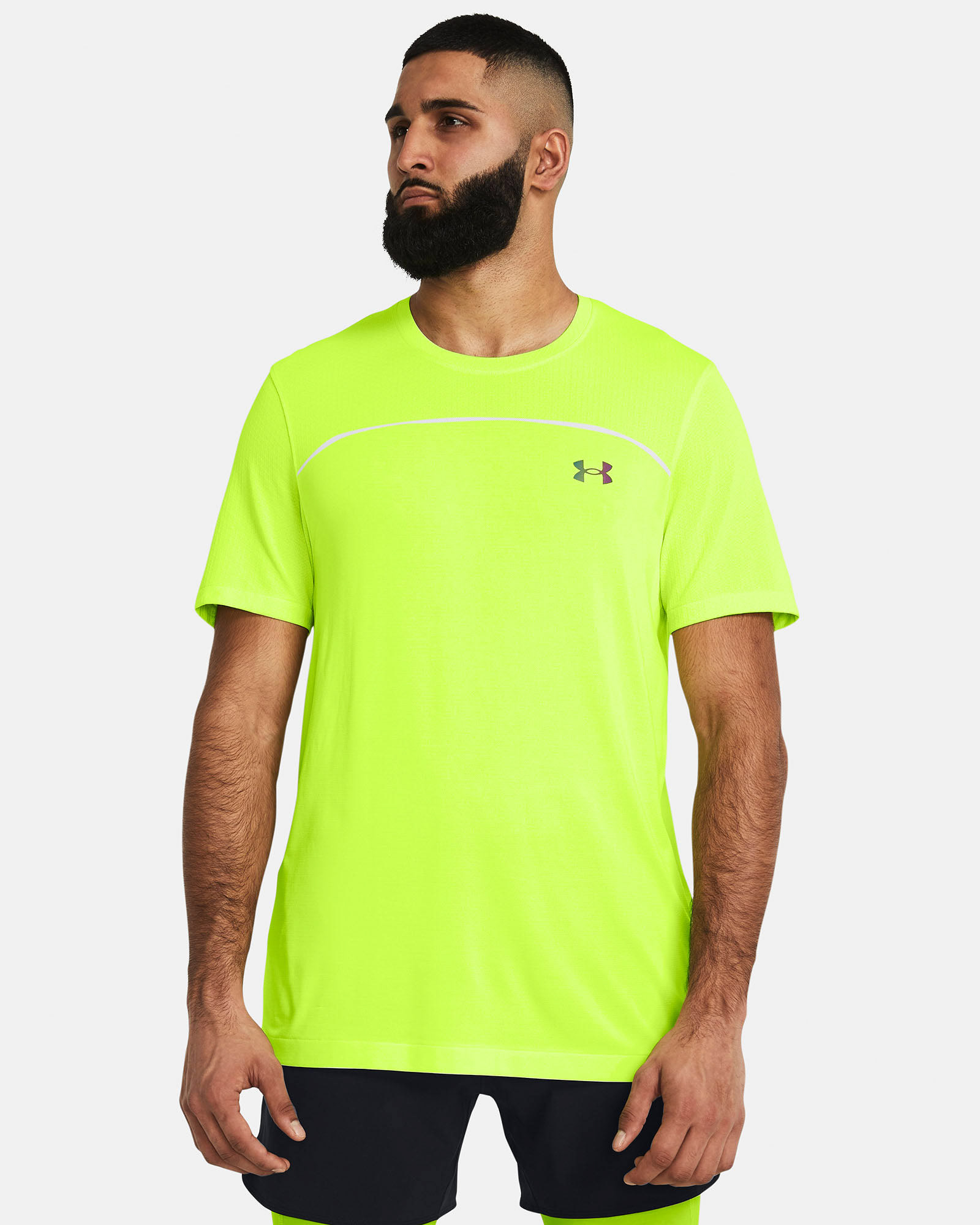Muhammad Abbasi | Under Armour | Ecom Shoot | Neon yellow short-sleeve training tee with black shorts