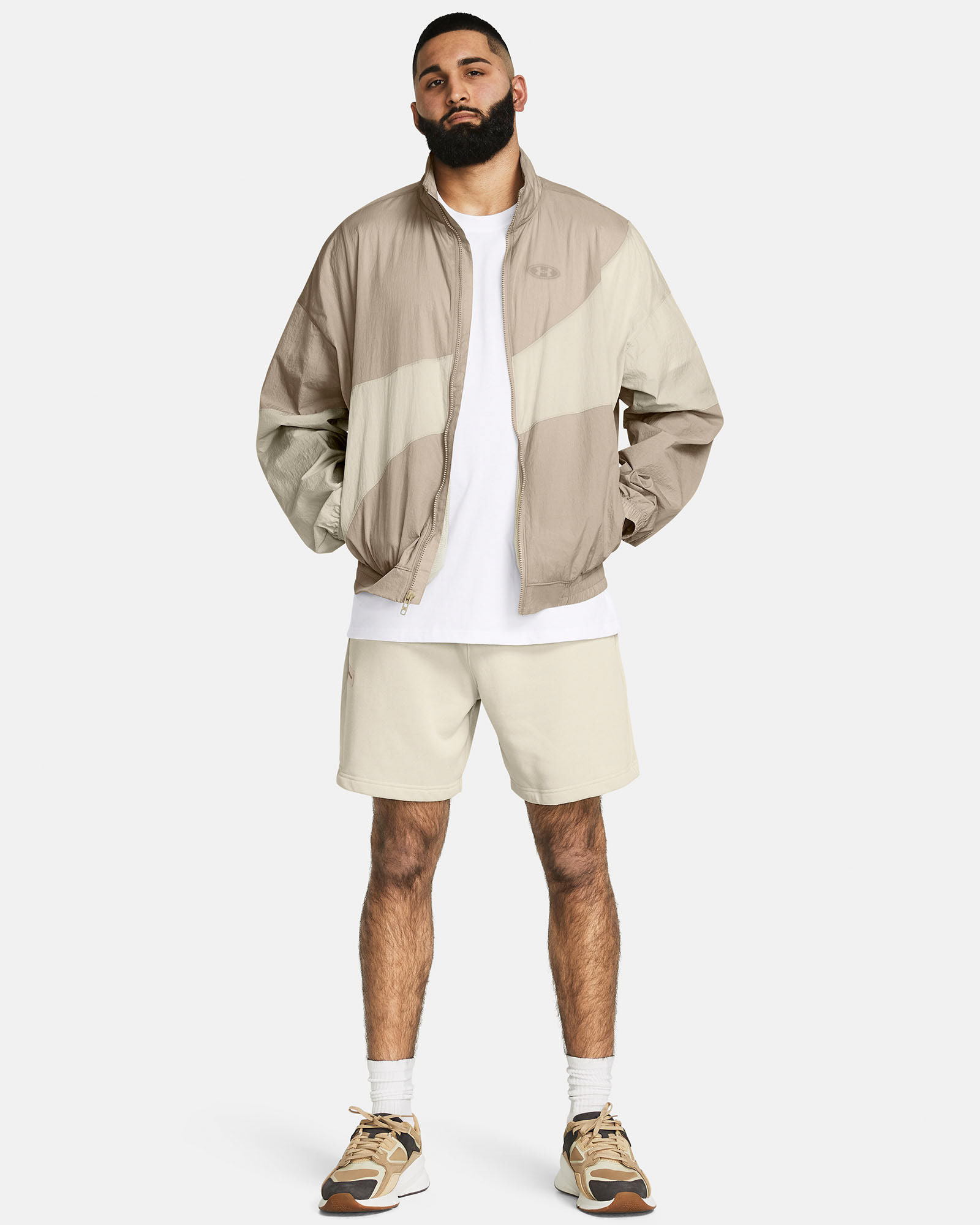 Muhammad Abbasi | Under Armour | Ecom Shoot | Beige windbreaker jacket with beige shorts