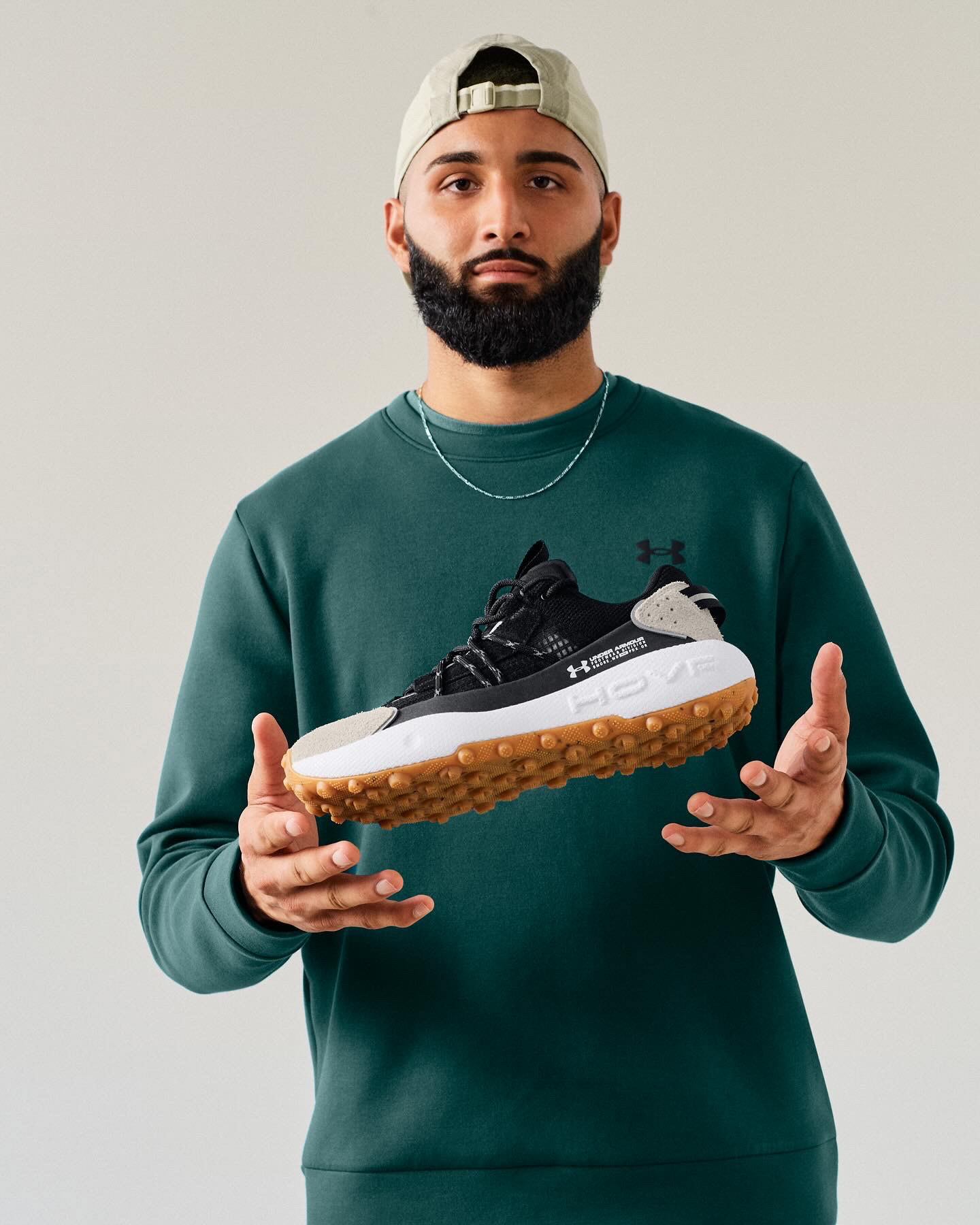 Muhammad Abbasi | Under Armour | Fat Tire Venture Pro | Holding the Fat Tire Venture Pro sneaker close-up
