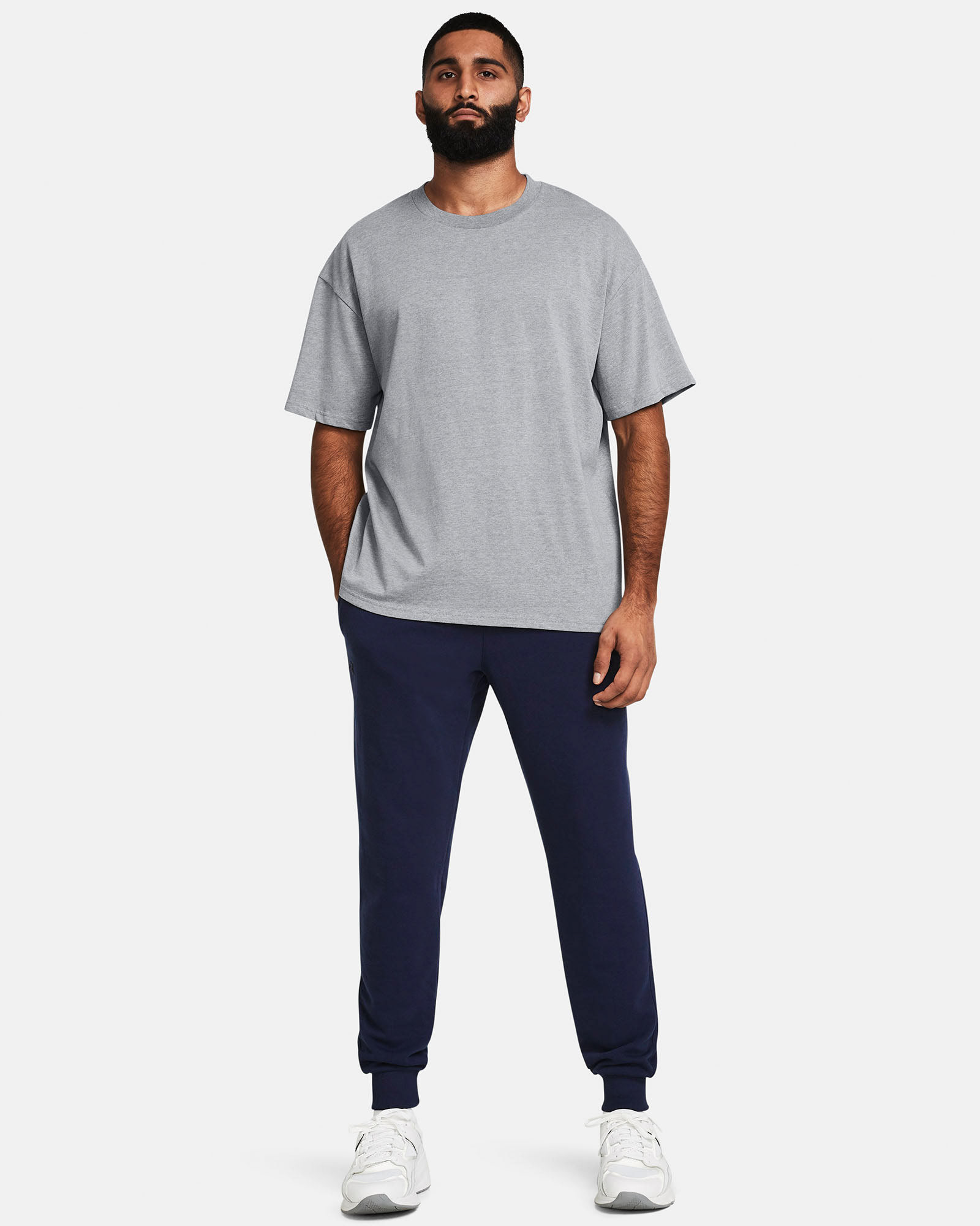 Muhammad Abbasi | Under Armour | Ecom Shoot | Light grey oversized tee with navy joggers