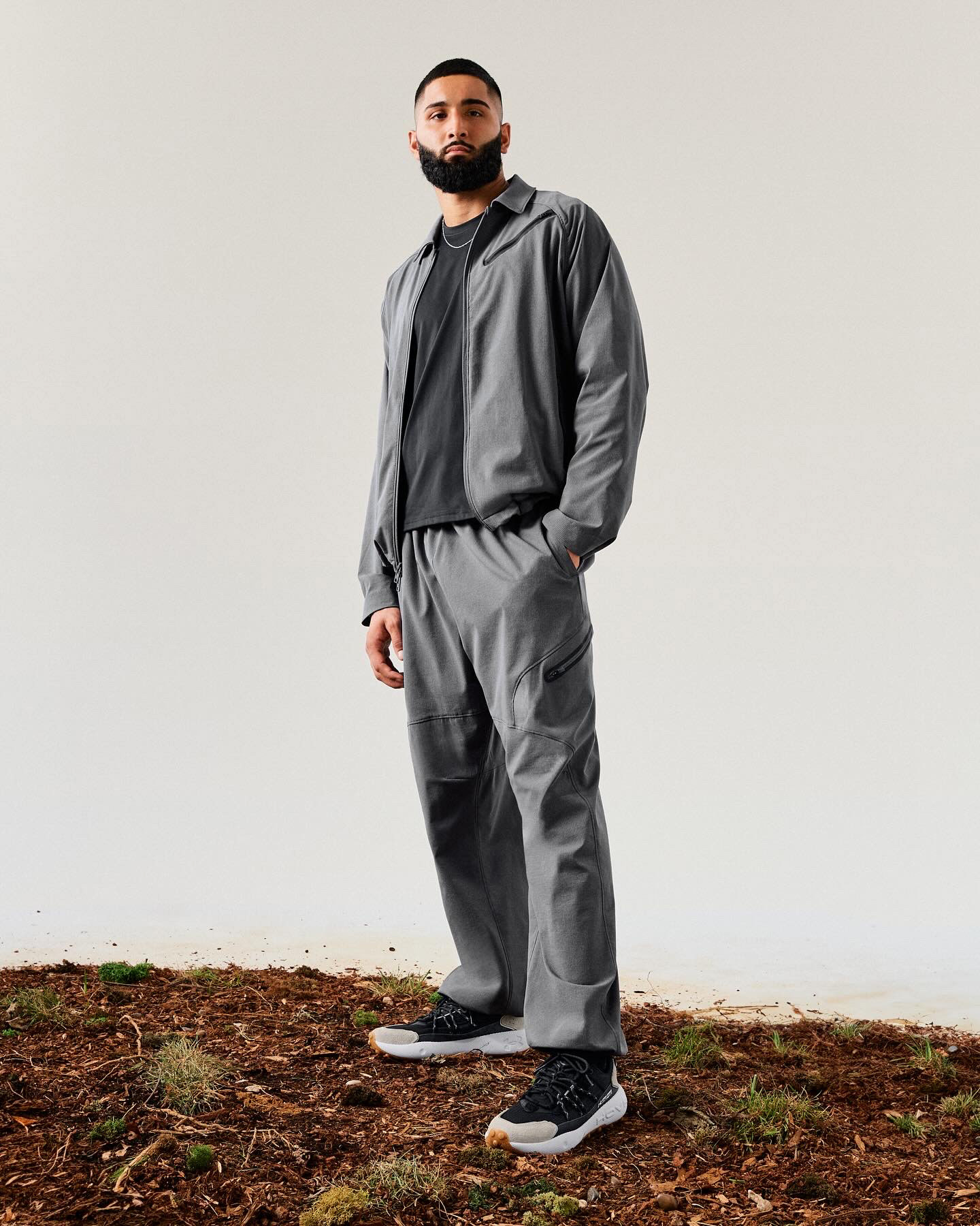 Muhammad Abbasi | Under Armour | Fat Tire Venture Pro | Wearing full grey tracksuit on natural backdrop