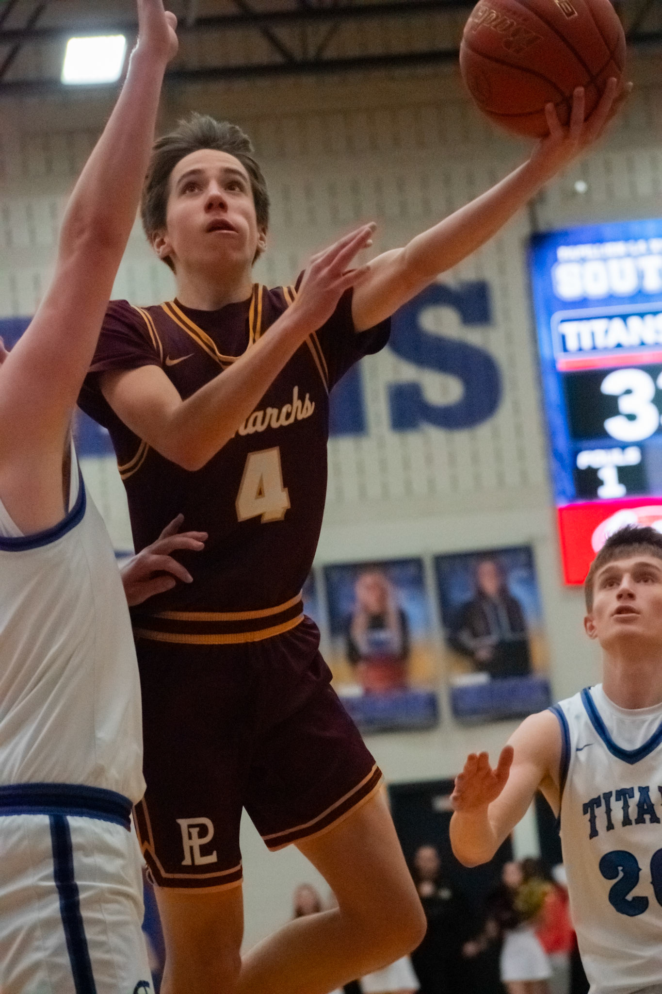 Sam Boudreau drives to the basket for a layup during the game against Papillion La Vista South on Feb 9, 2024.