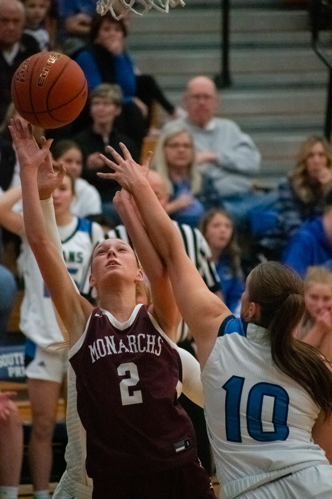 Rease Murtaugh attempts to rebound the ball against the faceoff between Papillion La Vista and Papillion La Vista South on Feb 9, 2024.