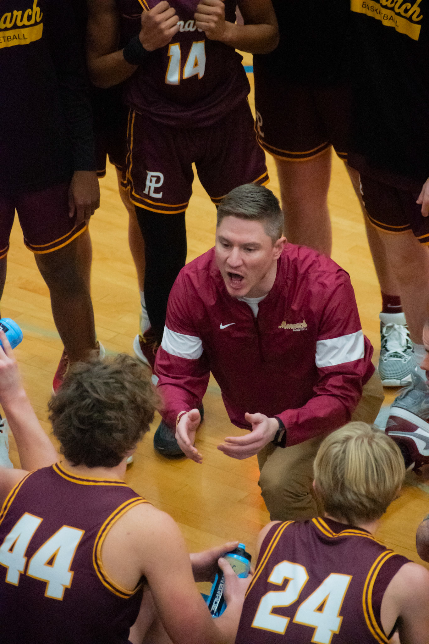 Head Coach Will Pope coaches his team during a full timeout.