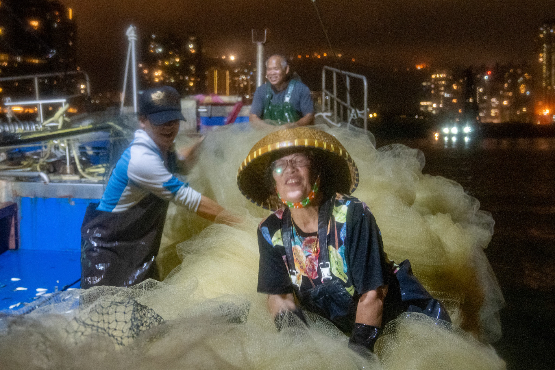On a two day overnight fishing trip we follow one boat going out to fish off Lamma Island overnight and return to sell the fish in the Aberdeen fish market. 22/5/2022, Aberdeen, Hong Kong, China.