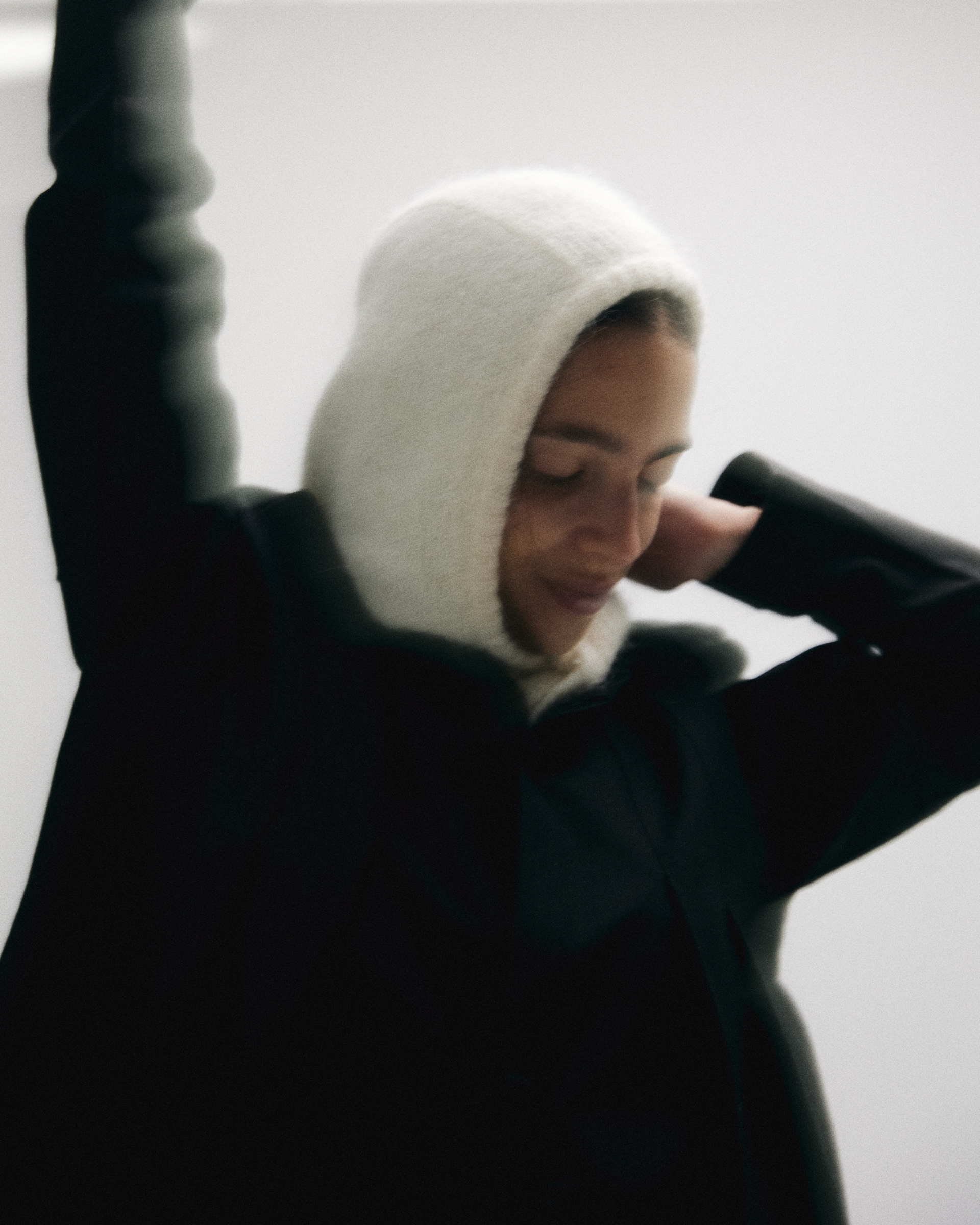 Winter outerwear with fur hood moody fashion editorial — commercial photography by Mason Maengkom, NYC