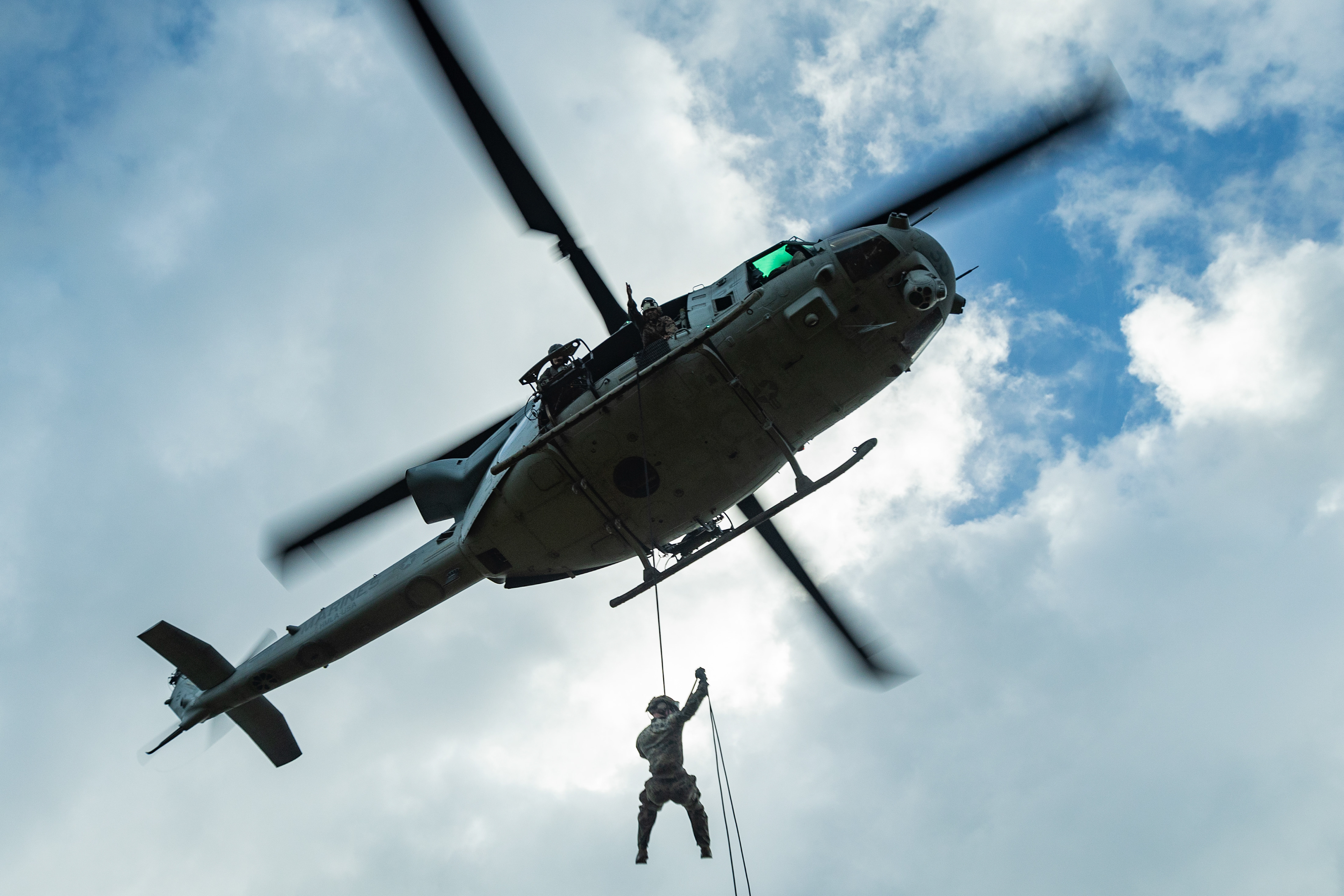 U.S. Marines with III Marine Expeditionary Force rappel from a UH-1Y Venom assigned to Marine Light Attack Helicopter Squadron 169 during special patrol insertion and extraction training at Landing Zone Starling, Camp Schwab on Sept. 21, 2023 in Okinawa, Japan.