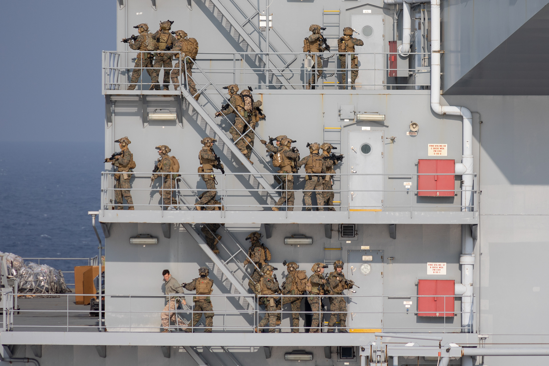 U.S. Marines with the maritime raid force, 31st Marine Expeditionary Unit, conduct a visit, board, search, and seizure exercise aboard the USS Miguel Keith (ESB 5) on Feb. 11, 2024 in the Philippine Sea.