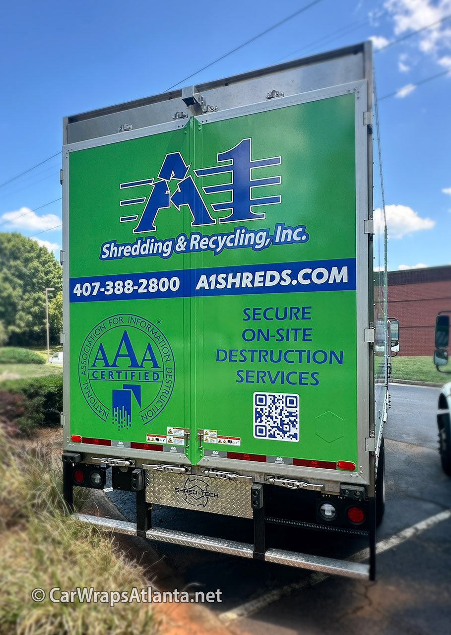 Full wrap on the recycling box truck demonstrating high visibility fleet branding in Atlanta.