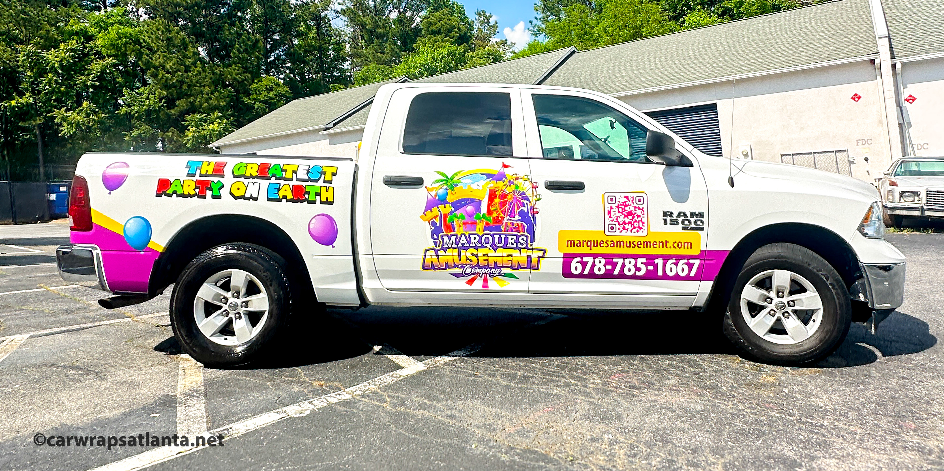 Hero image: Full vehicle wrap on a truck for a bounce house and event rental company in Powder Springs, GA.