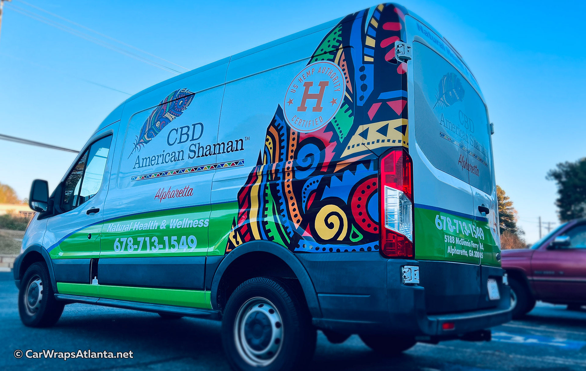 Full view of the wrapped Ford Transit van demonstrating high visibility for CBD American Shaman's fleet.