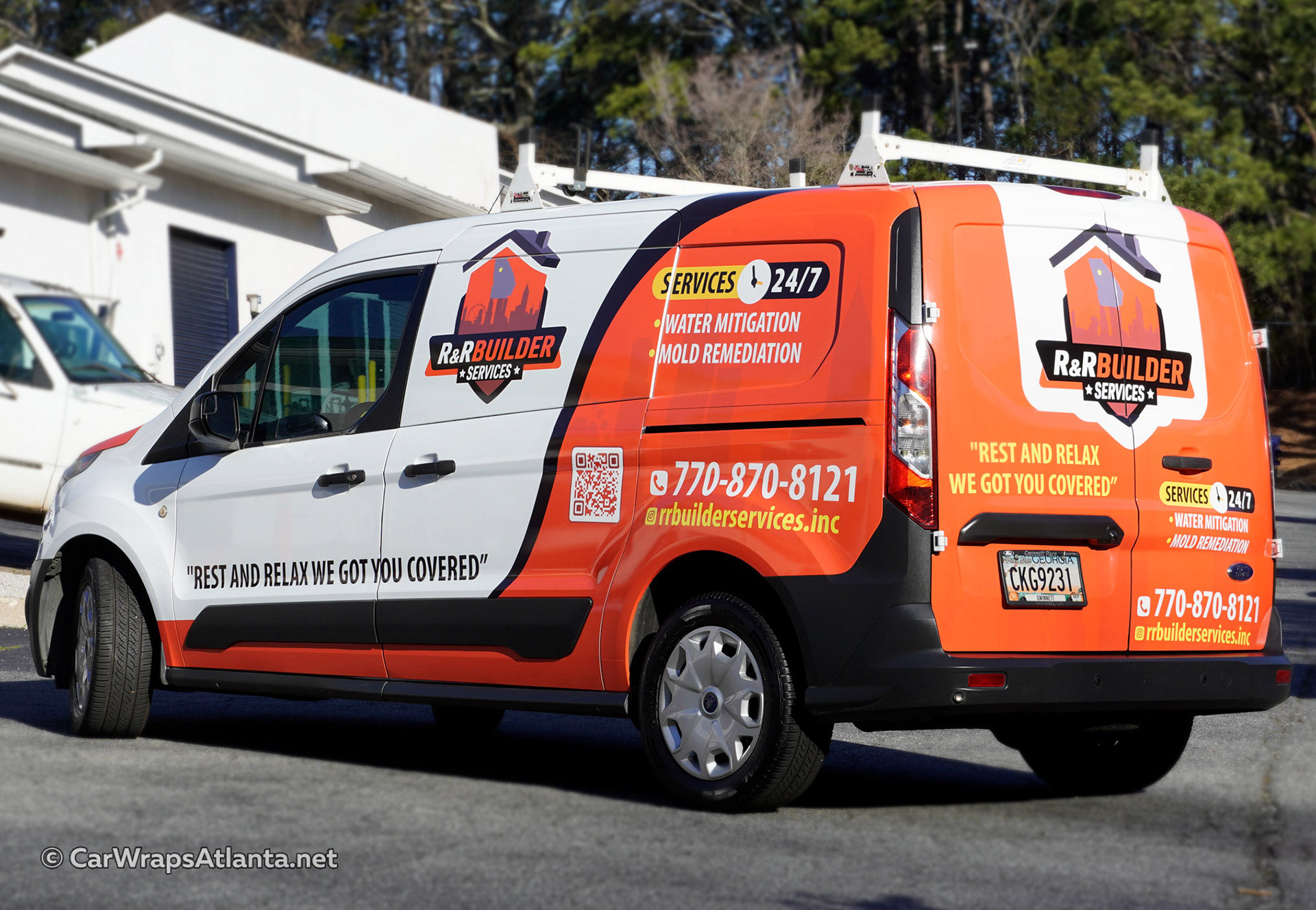 Side view of the Ford Transit Connect partial wrap showcasing professional contractor branding.