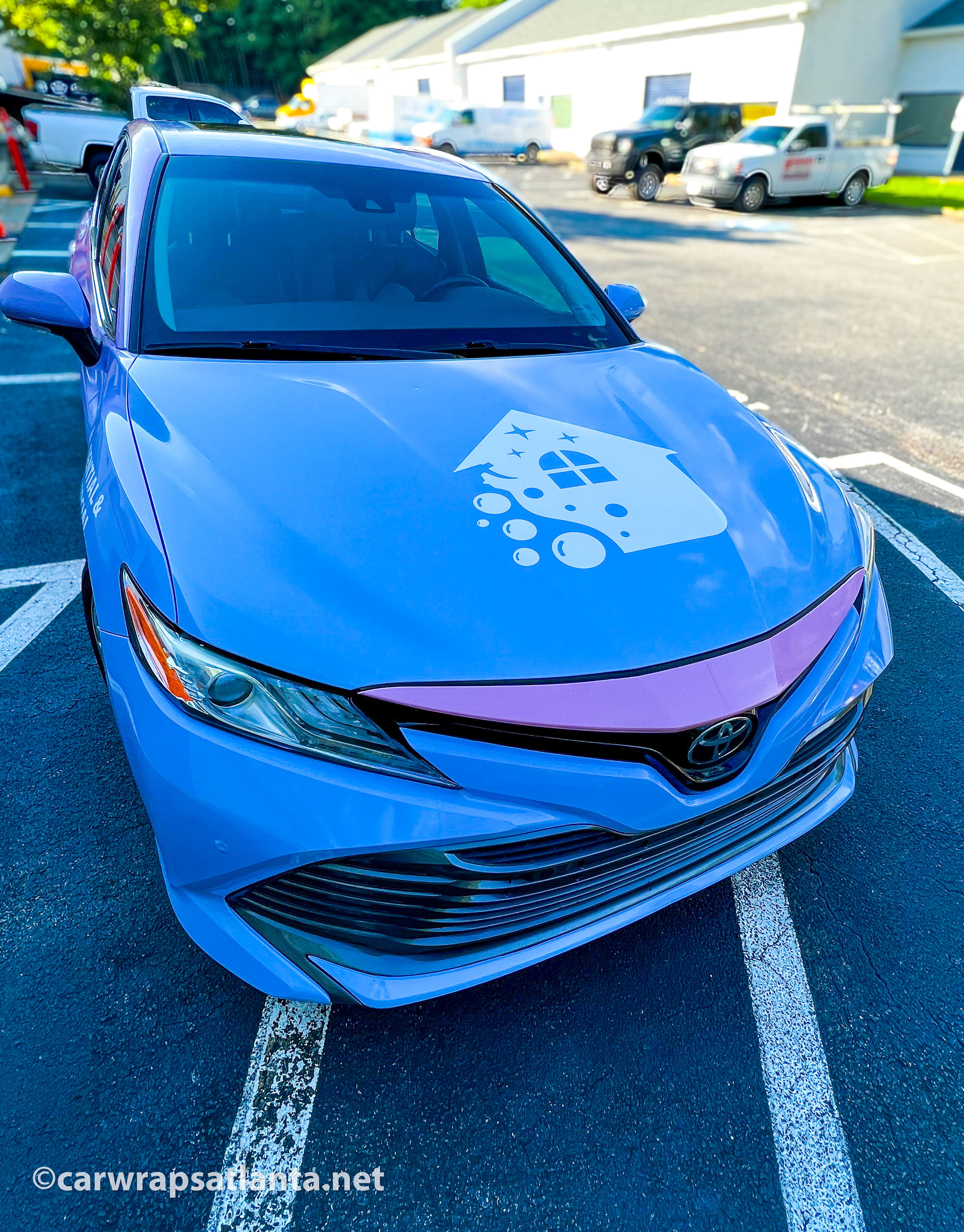 Final completed full wrap on a Toyota Camry for an Atlanta cleaning service company.