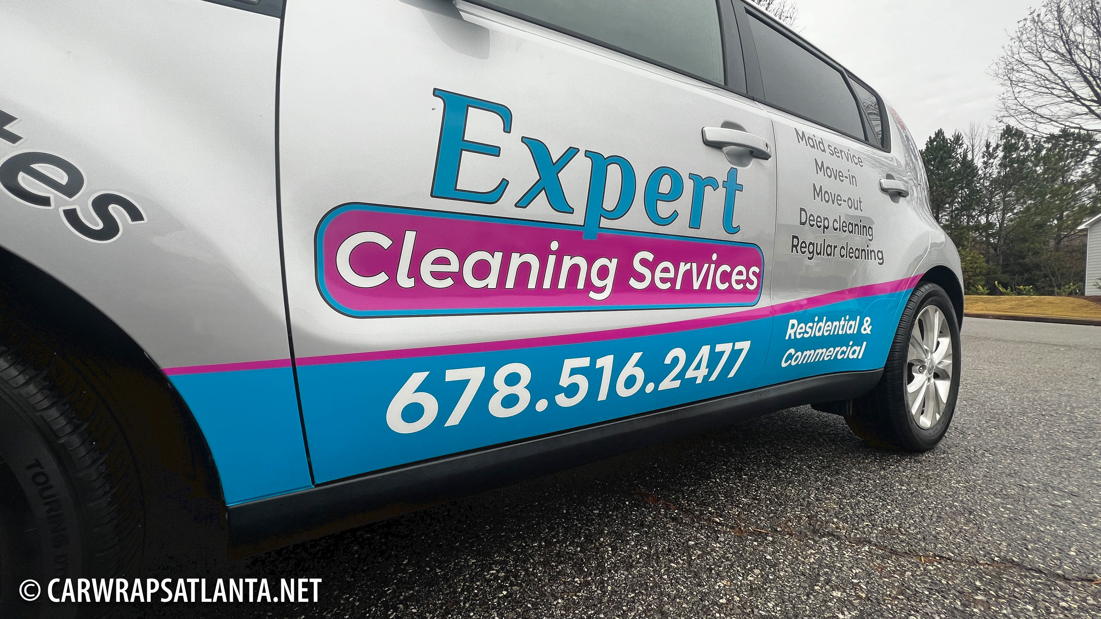 Kia Soul with partial vehicle wrap demonstrating mobile advertising for cleaning services in Atlanta.