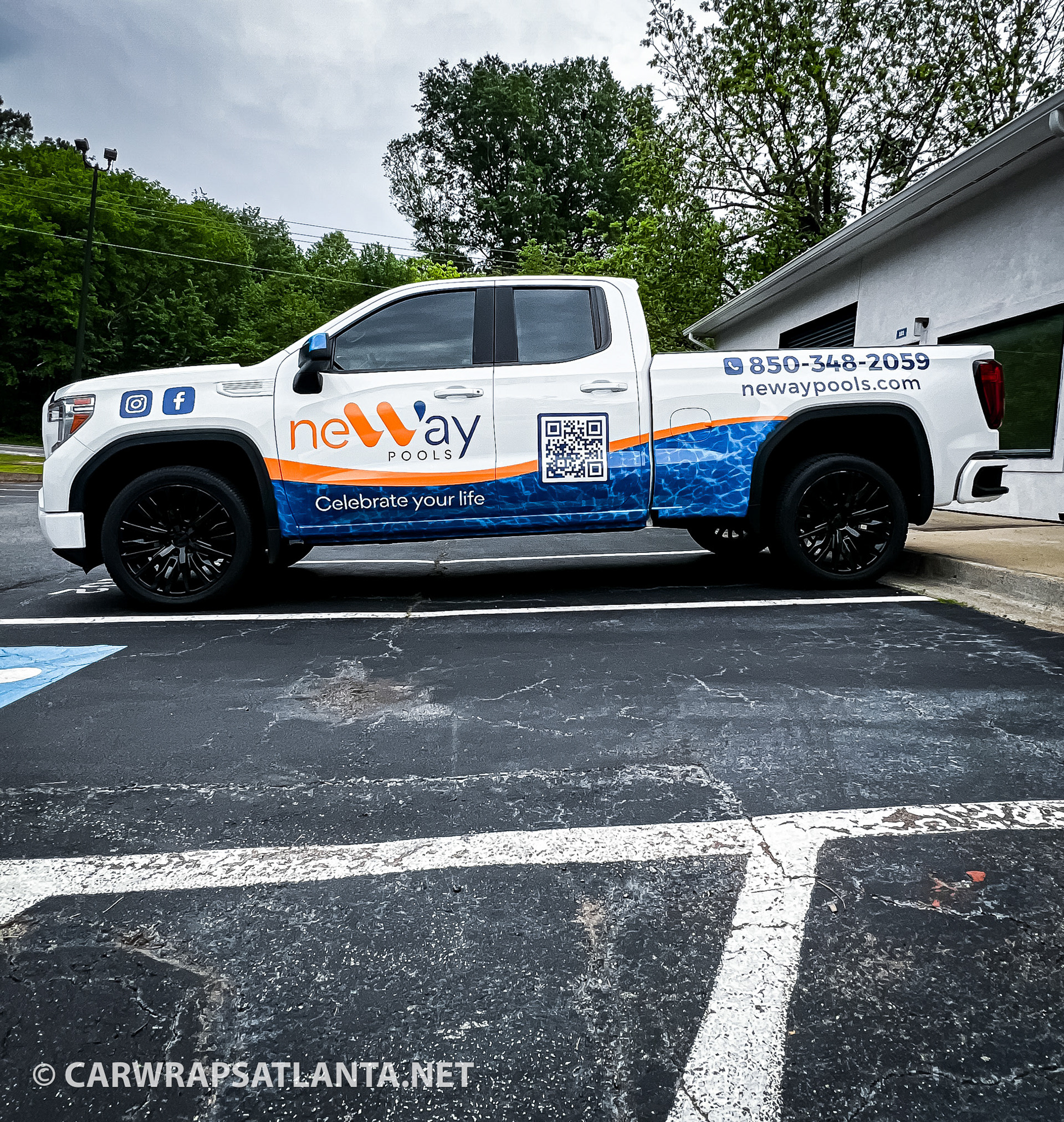 Custom partial wrap on a GMC Truck for Neway Pools, installed by Car Wraps Atlanta.
