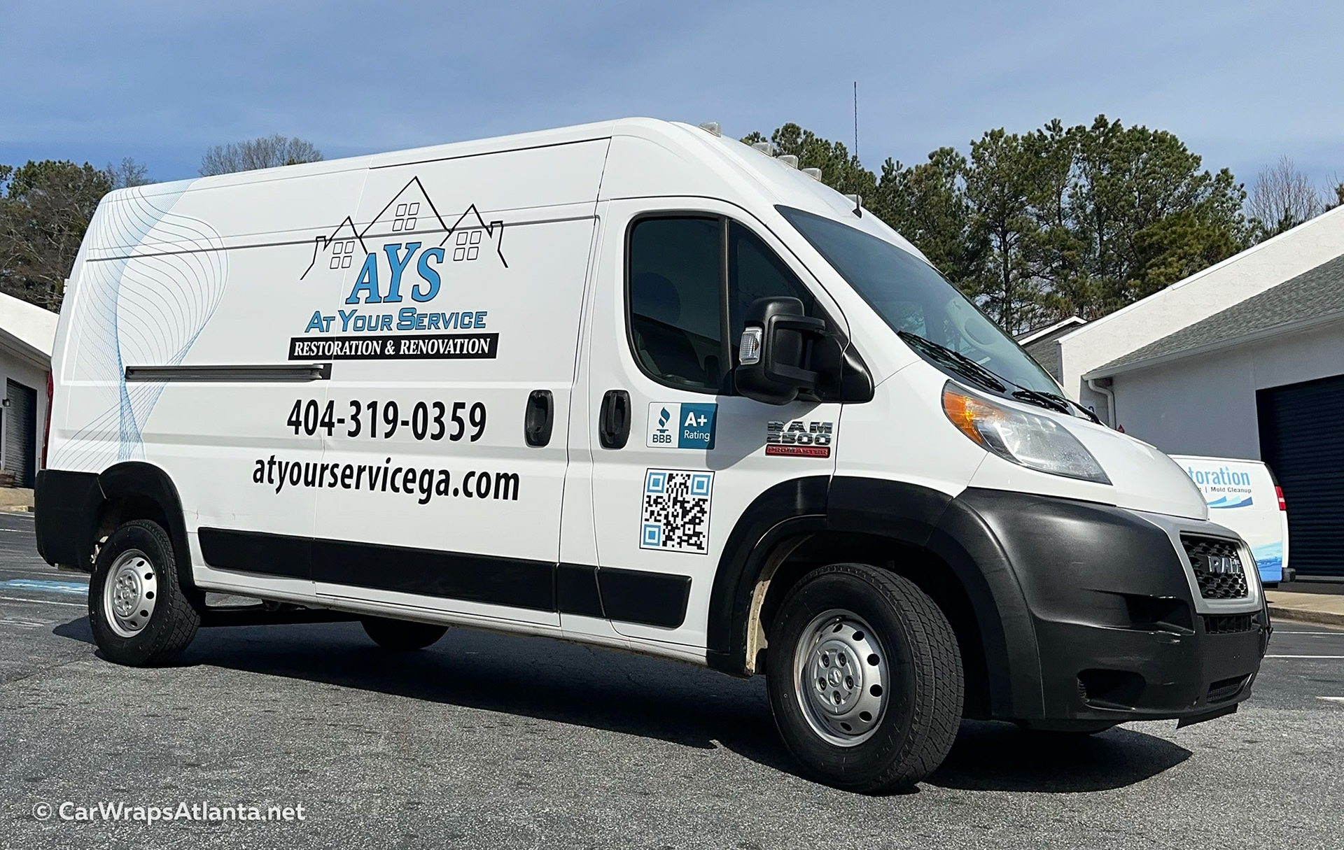 Custom fleet wrap design on commercial van showcasing vehicle graphics for renovation business in Atlanta