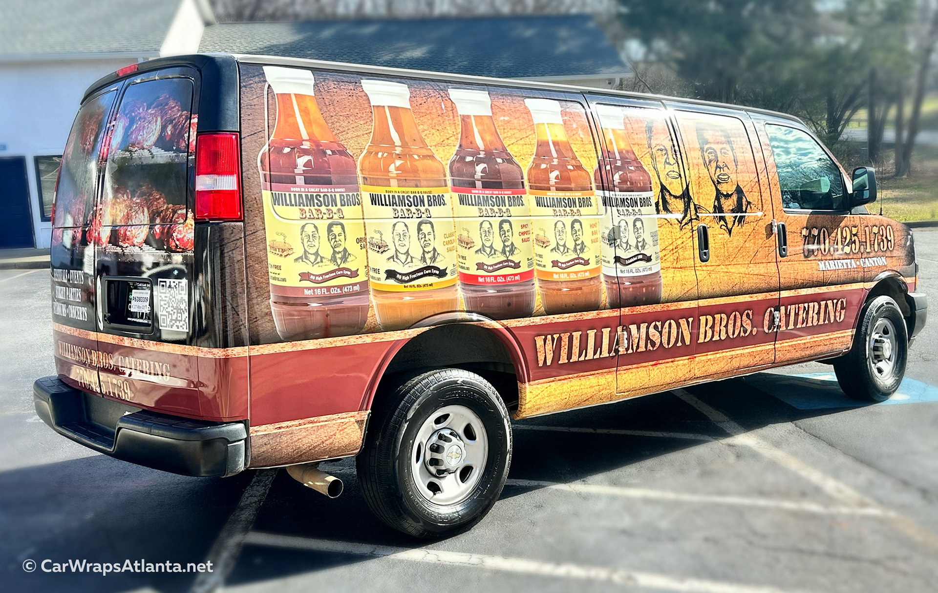 Full vehicle wrap on Chevy Express van for Williamson Bros Bar-B-Q in Atlanta, showcasing custom vinyl vehicle graphics with bold flame artwork and branded fleet wrap design.