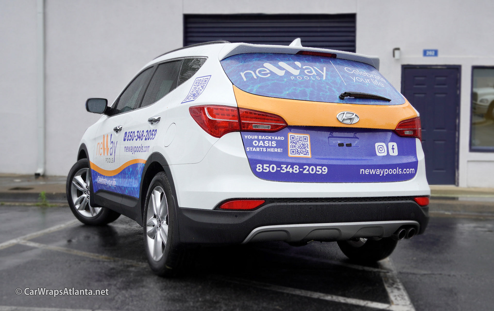 Side view of the partial vehicle wrap on the Santa Fe, showcasing strategic placement for fleet branding.