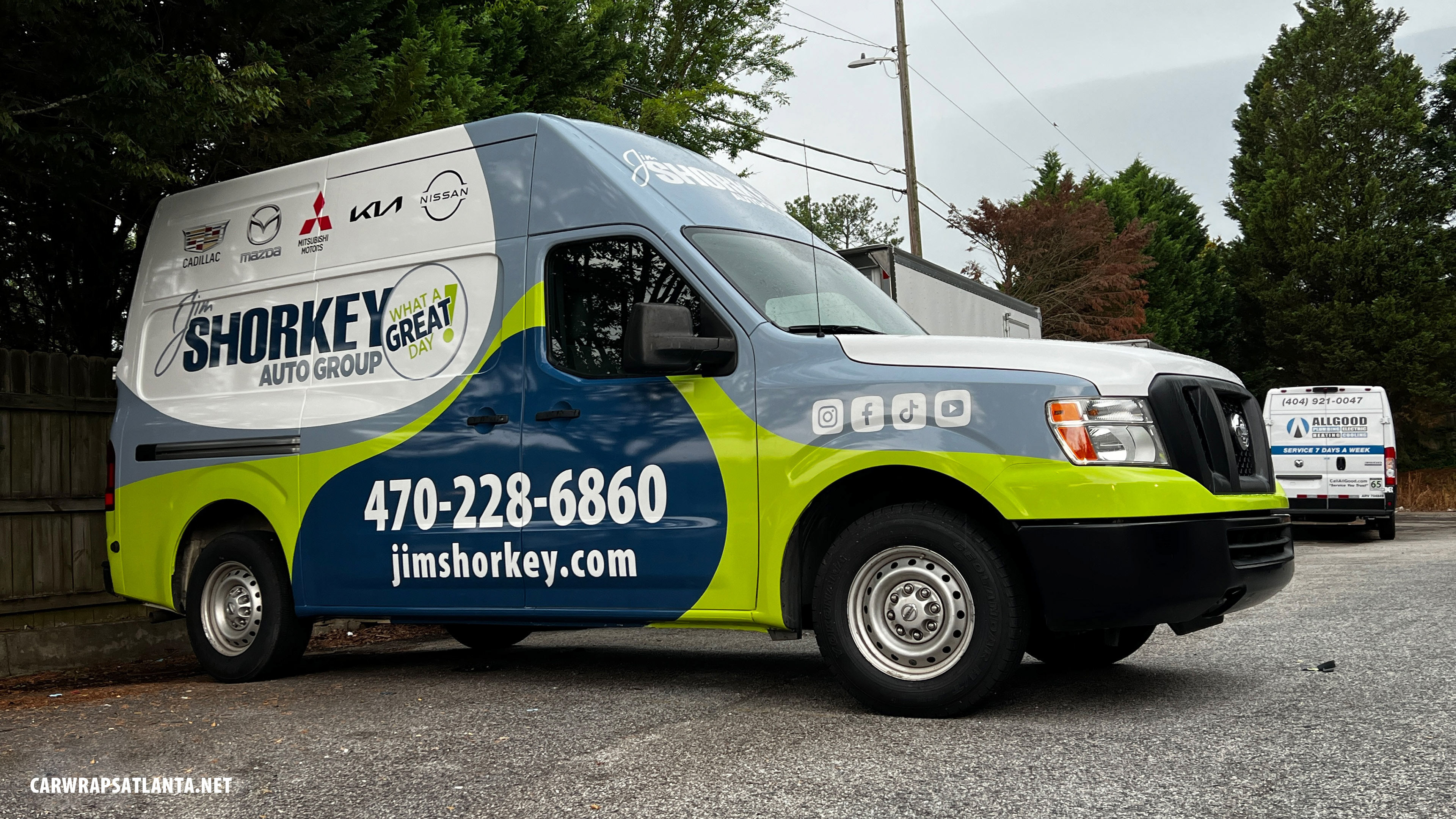 Hero image: Full commercial wrap on a Nissan NV Cargo Van for Jim Shorkey Auto Group in Atlanta, GA.