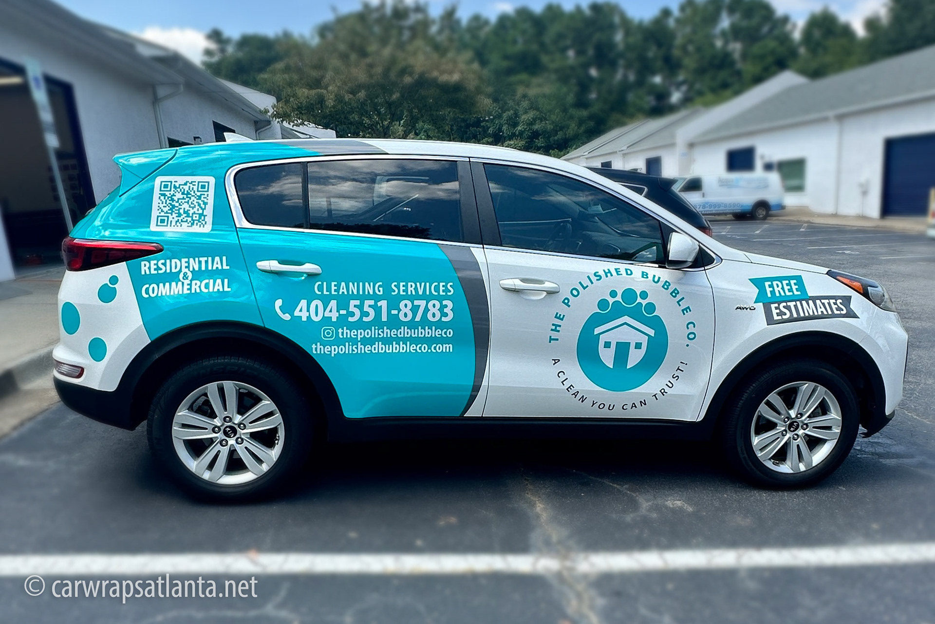 Stunning partial vehicle wrap on a white Kia Sorento for The Polished Bubble cleaning service in Atlanta.