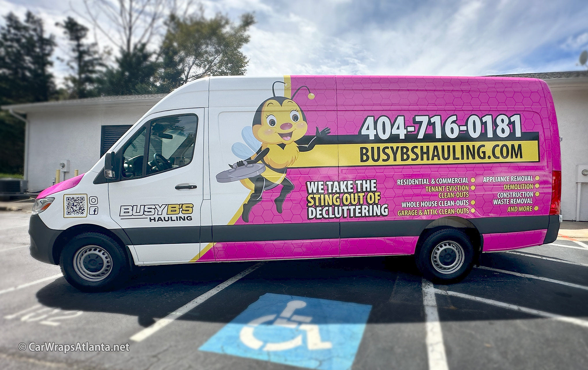 Close-up of the recycling message and bold graphics on the Sprinter van full wrap.