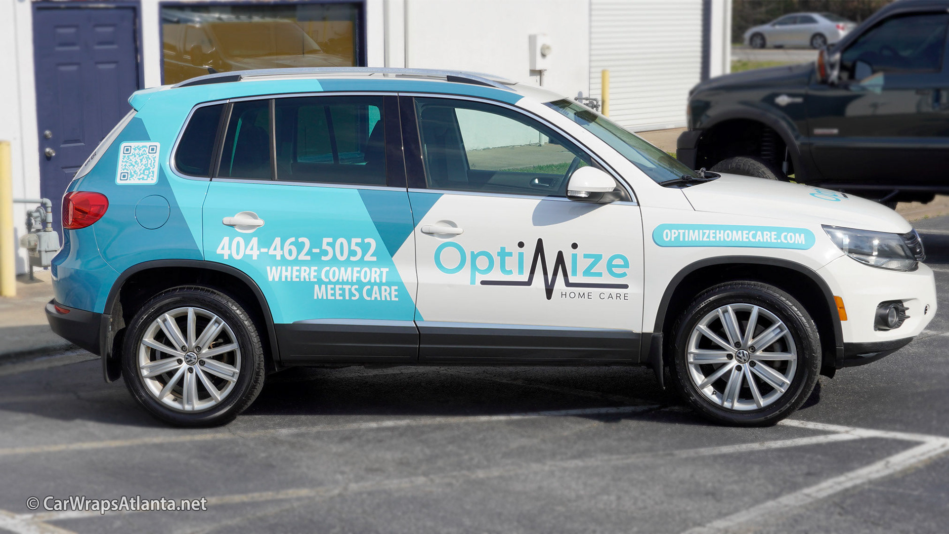 Hero image: Striking partial vehicle wrap on a Volkswagen Tiguan SUV for Optimize Home Care in Atlanta, GA.