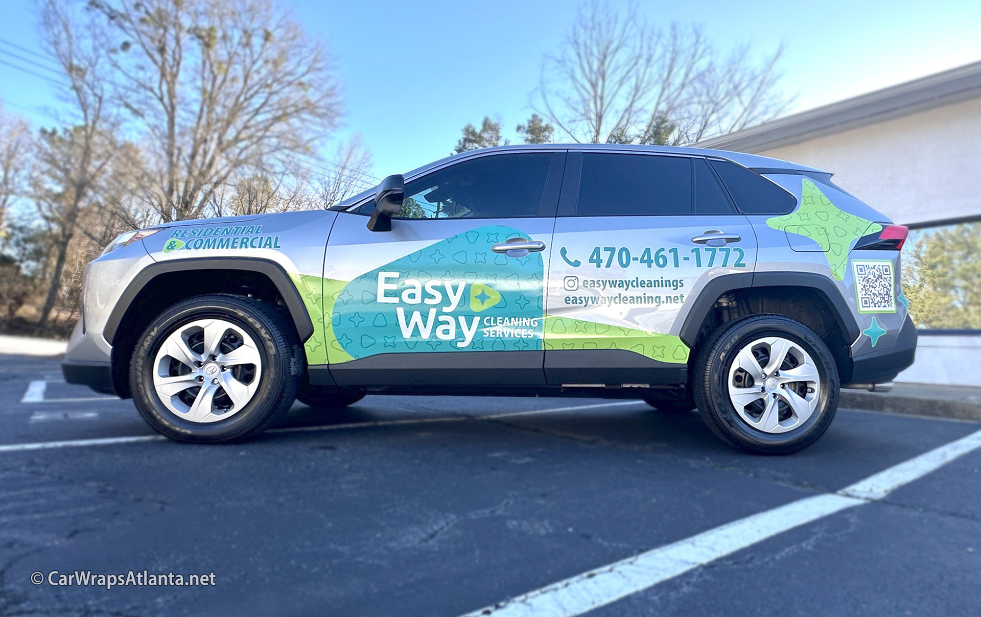 Hero image: Custom spot graphics and partial wrap on a Toyota RAV4 for an Atlanta cleaning service fleet.